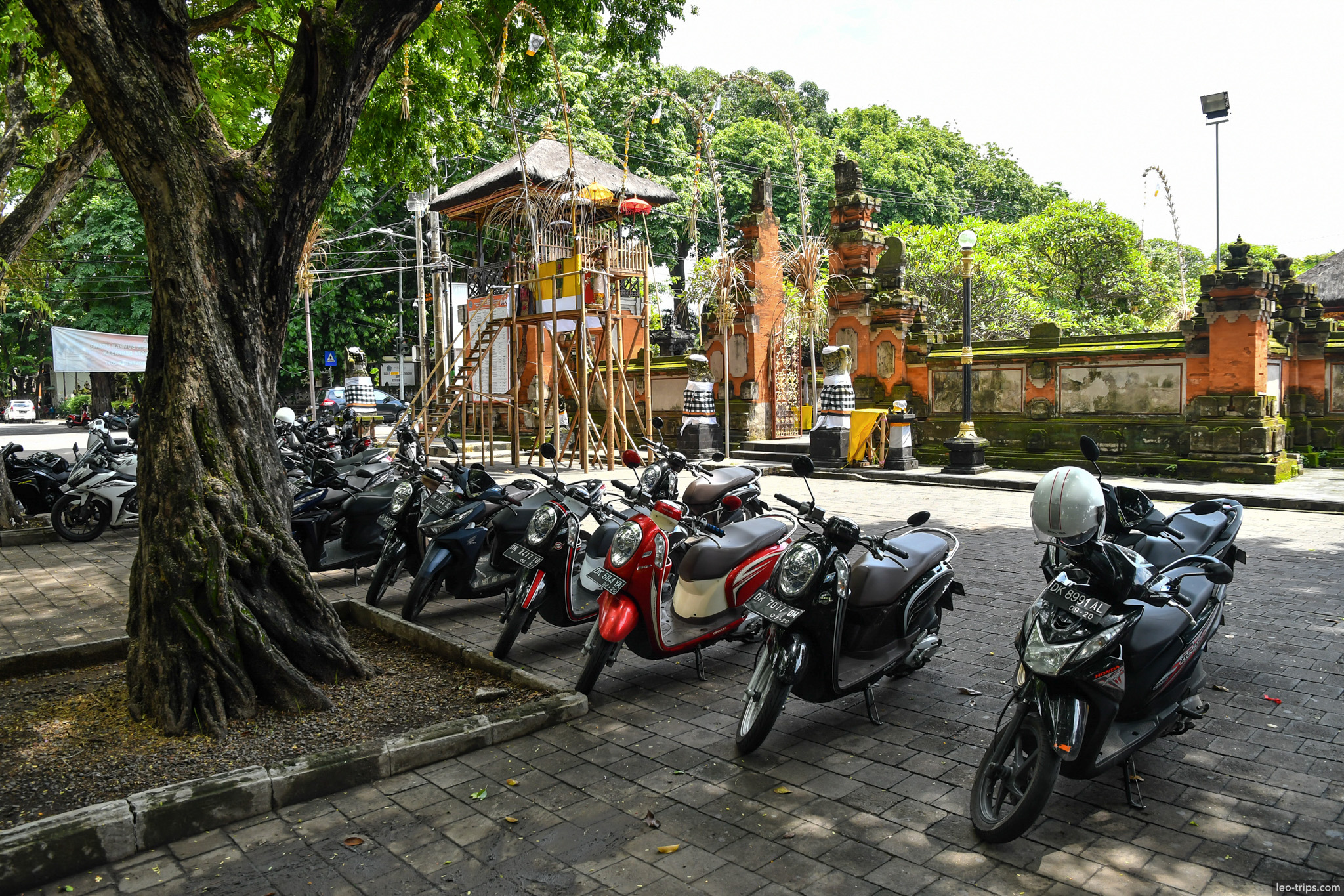 motorbikes parked near hindu temple entrance bali