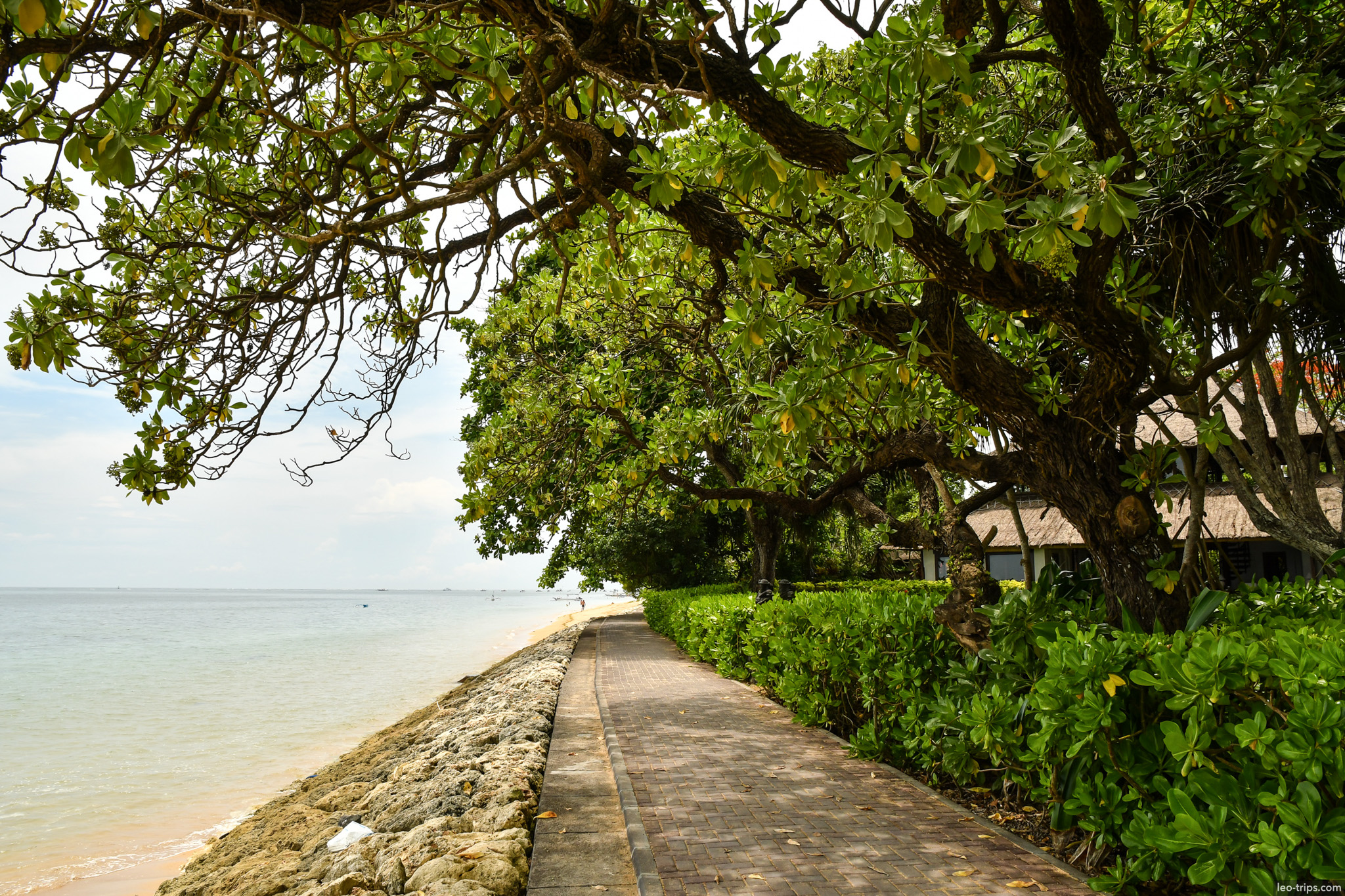shaded coastal walkway sanur beachfront bali