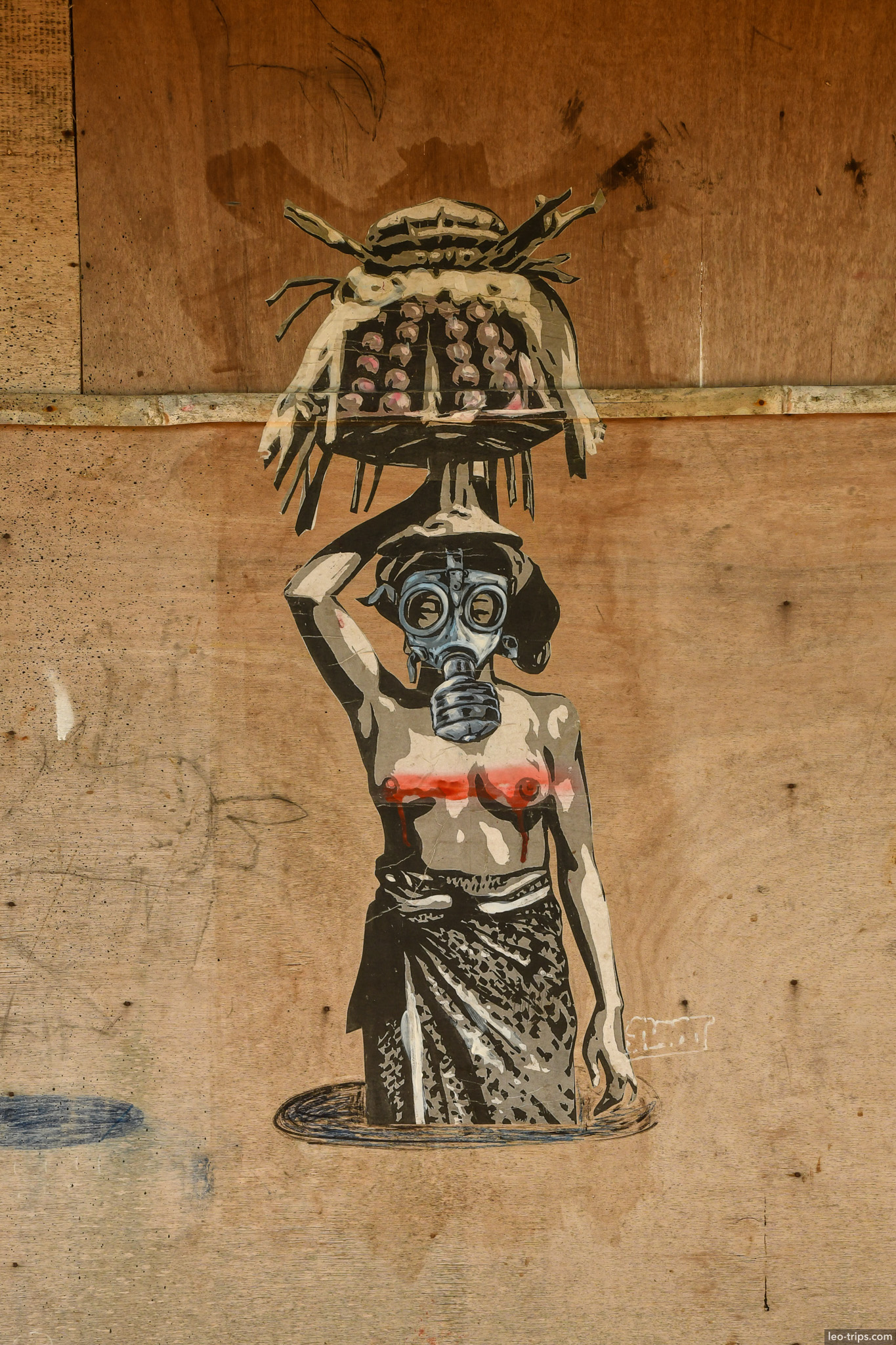 street art stencil woman with gas mask bali