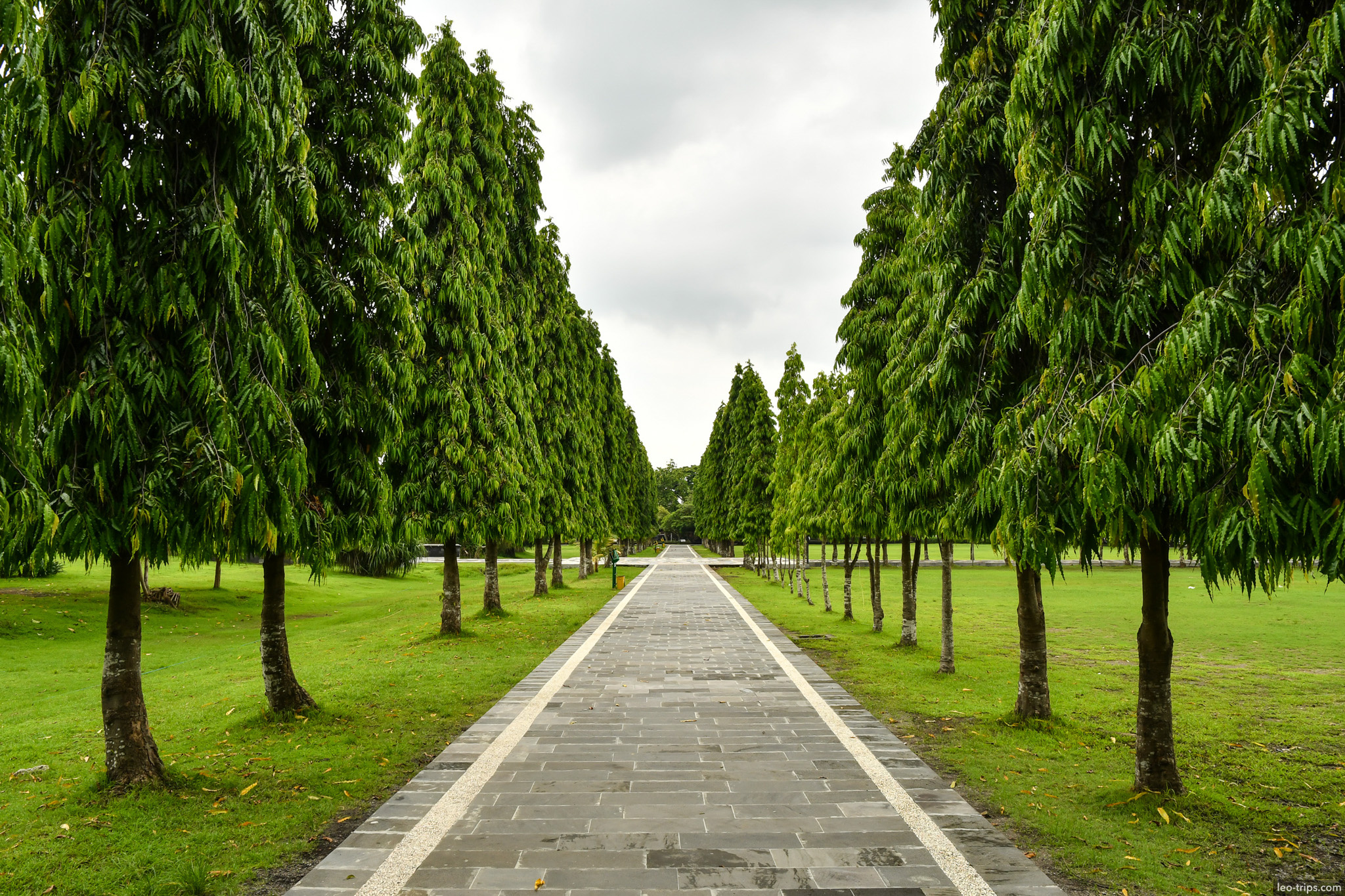 tree lined alley bajra sandhi monument bali
