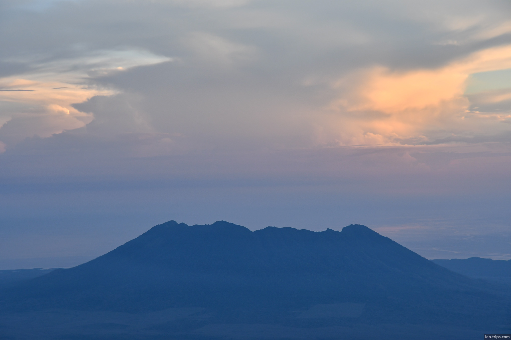 distant volcano silhouette at sunset ijen ijen lake