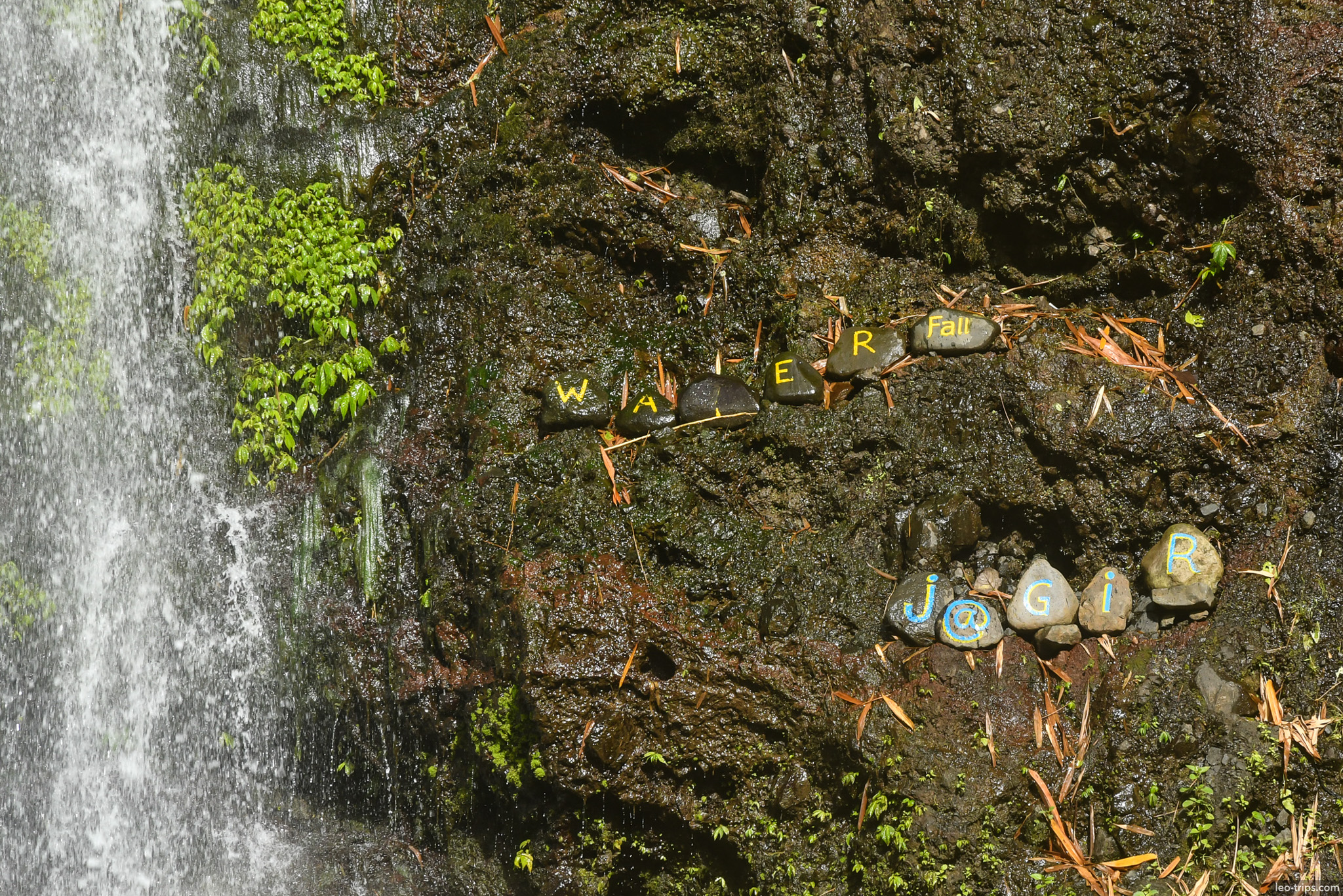 painted stones near waterfall ijen ijen lake