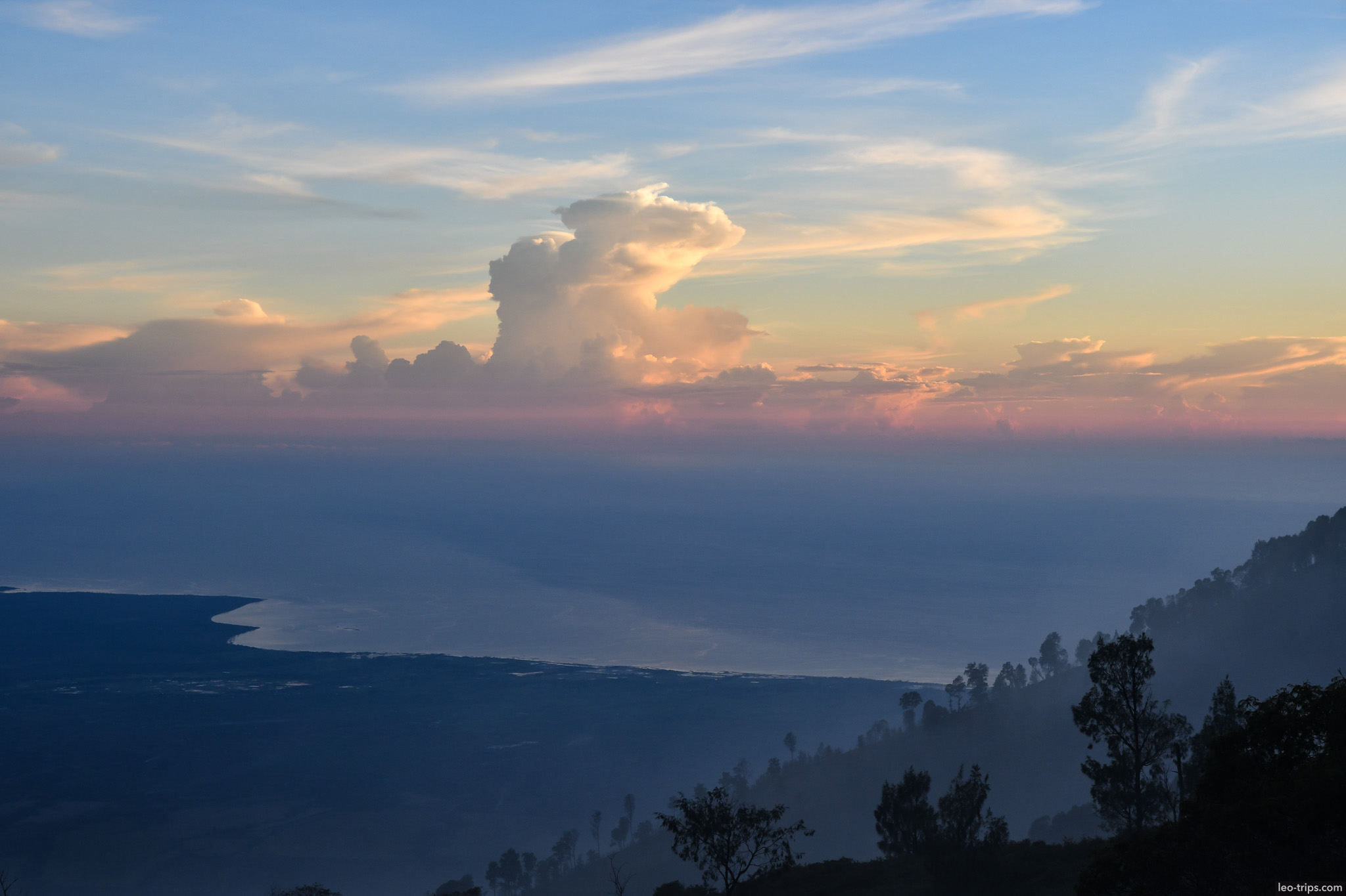 sunset clouds over coastline from ijen ijen lake