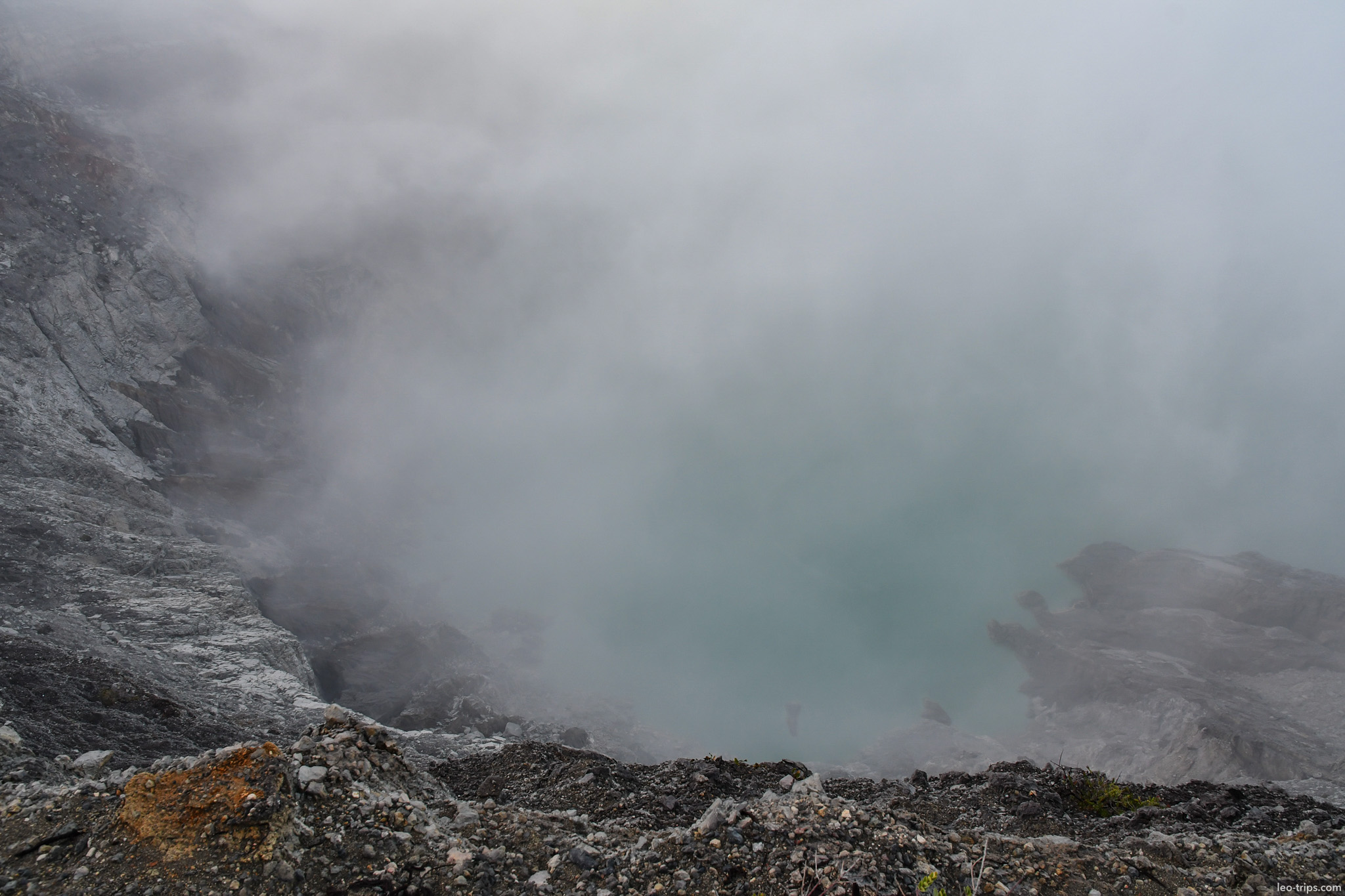 turquoise acid lake through volcanic steam ijen ijen lake