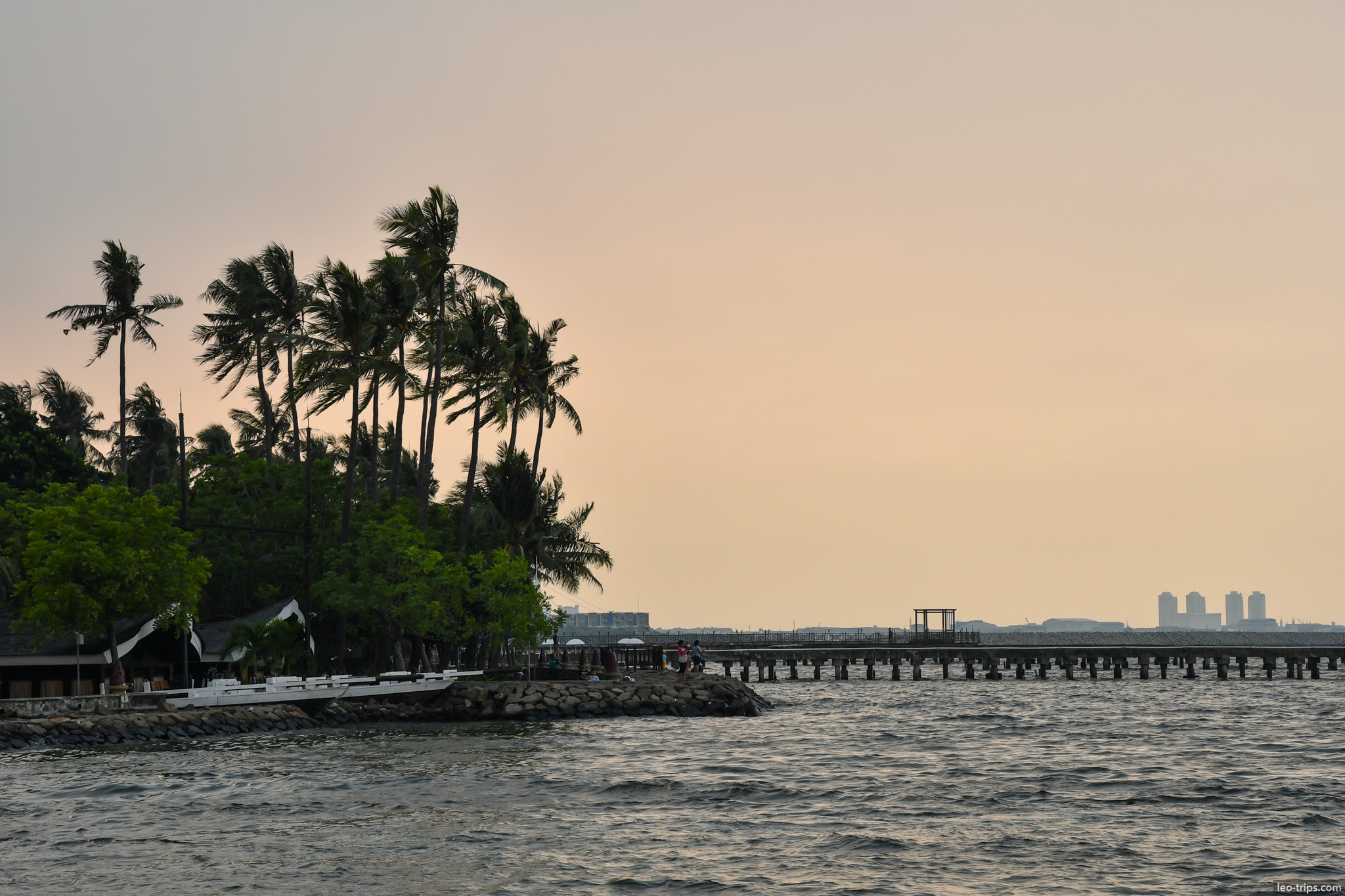 palm island pier silhouette sunset ancol jakarta