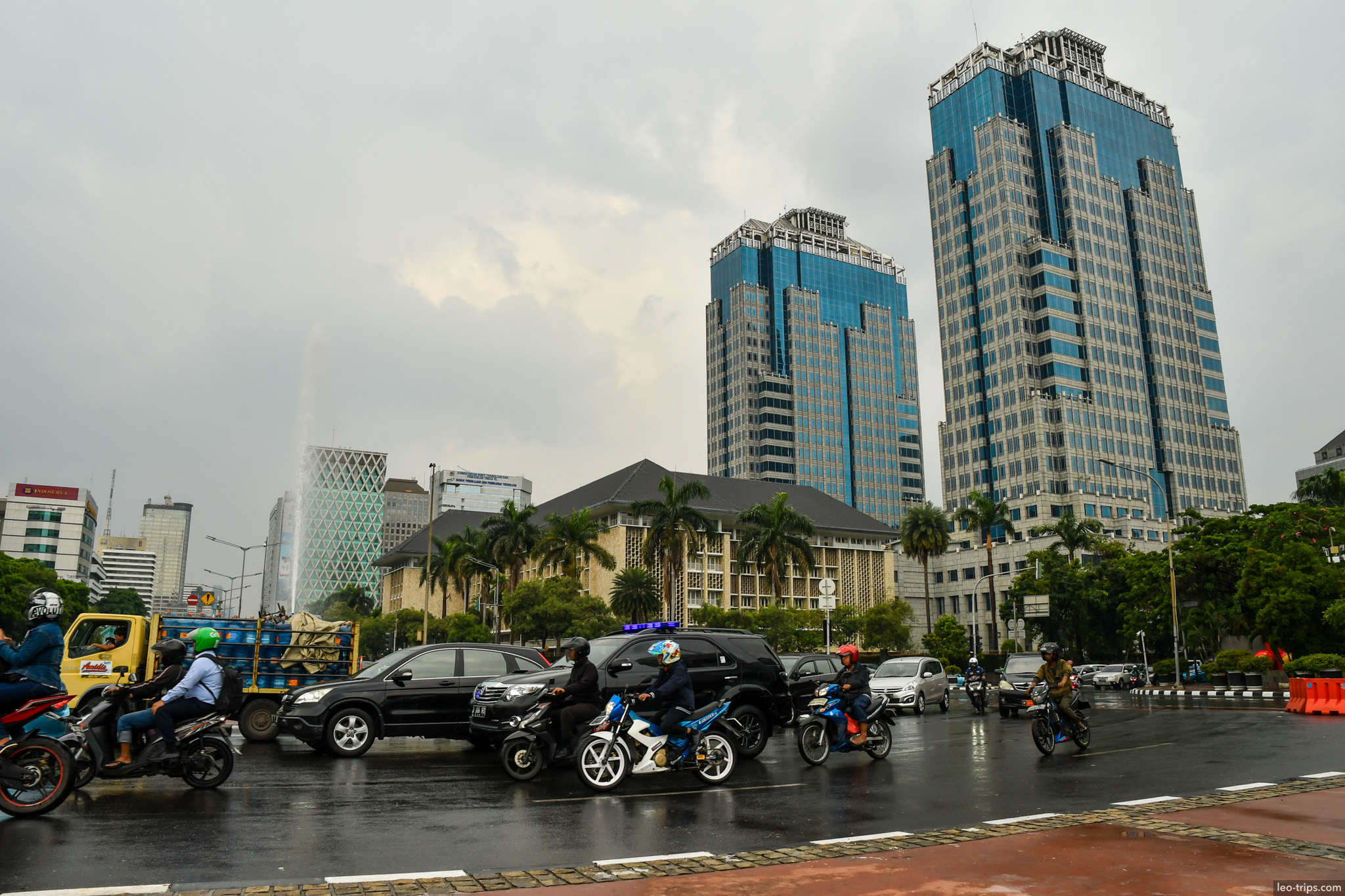 rainy intersection twin towers downtown jakarta jakarta