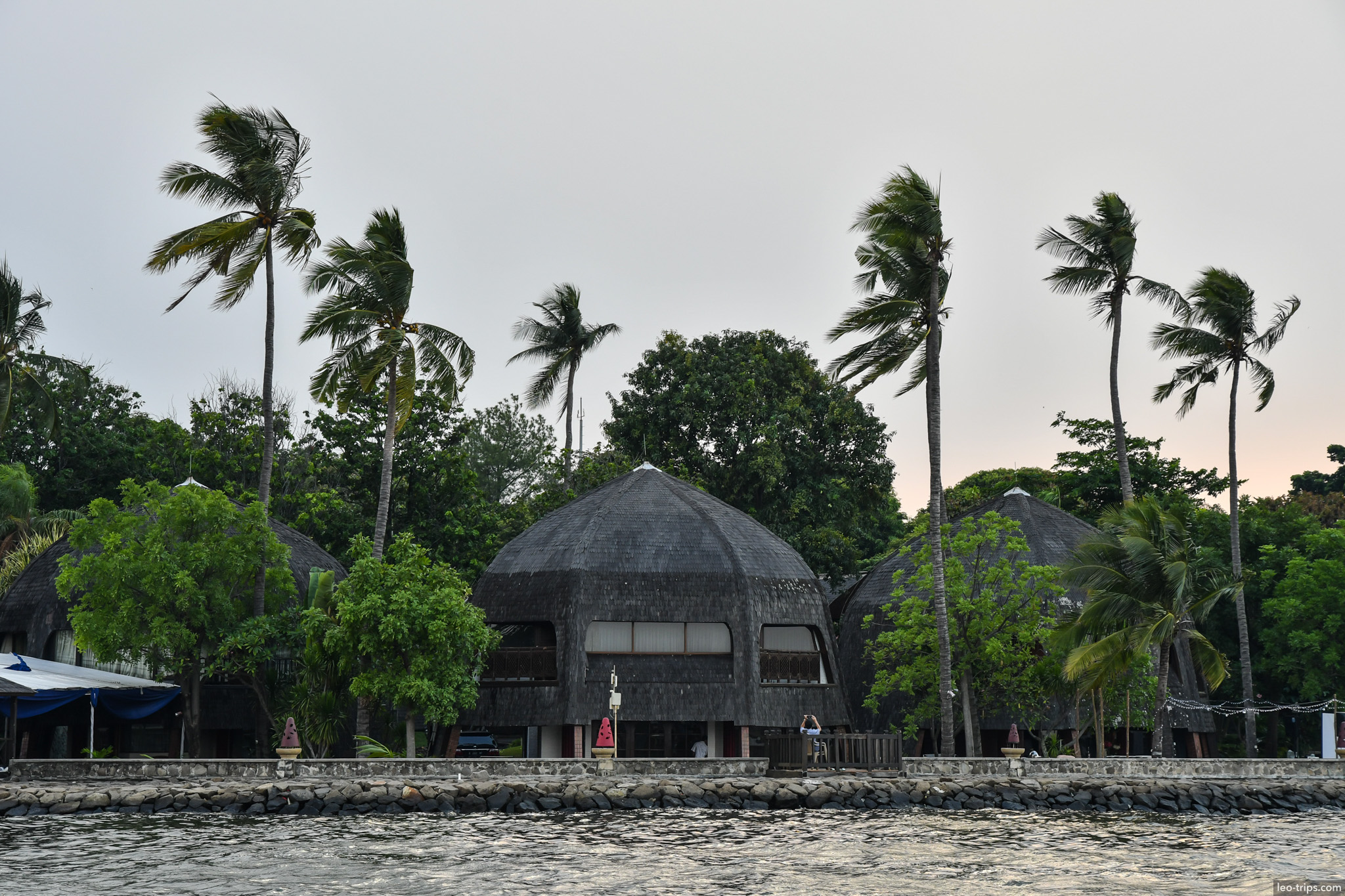 thatched roof resort building ancol waterfront jakarta