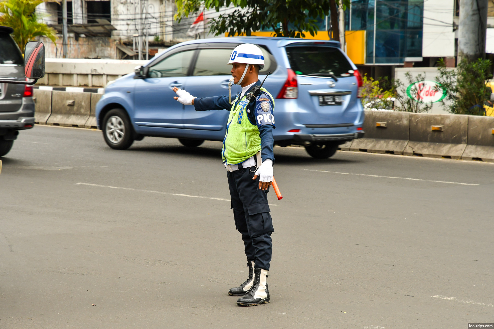traffic police officer directing cars jakarta jakarta