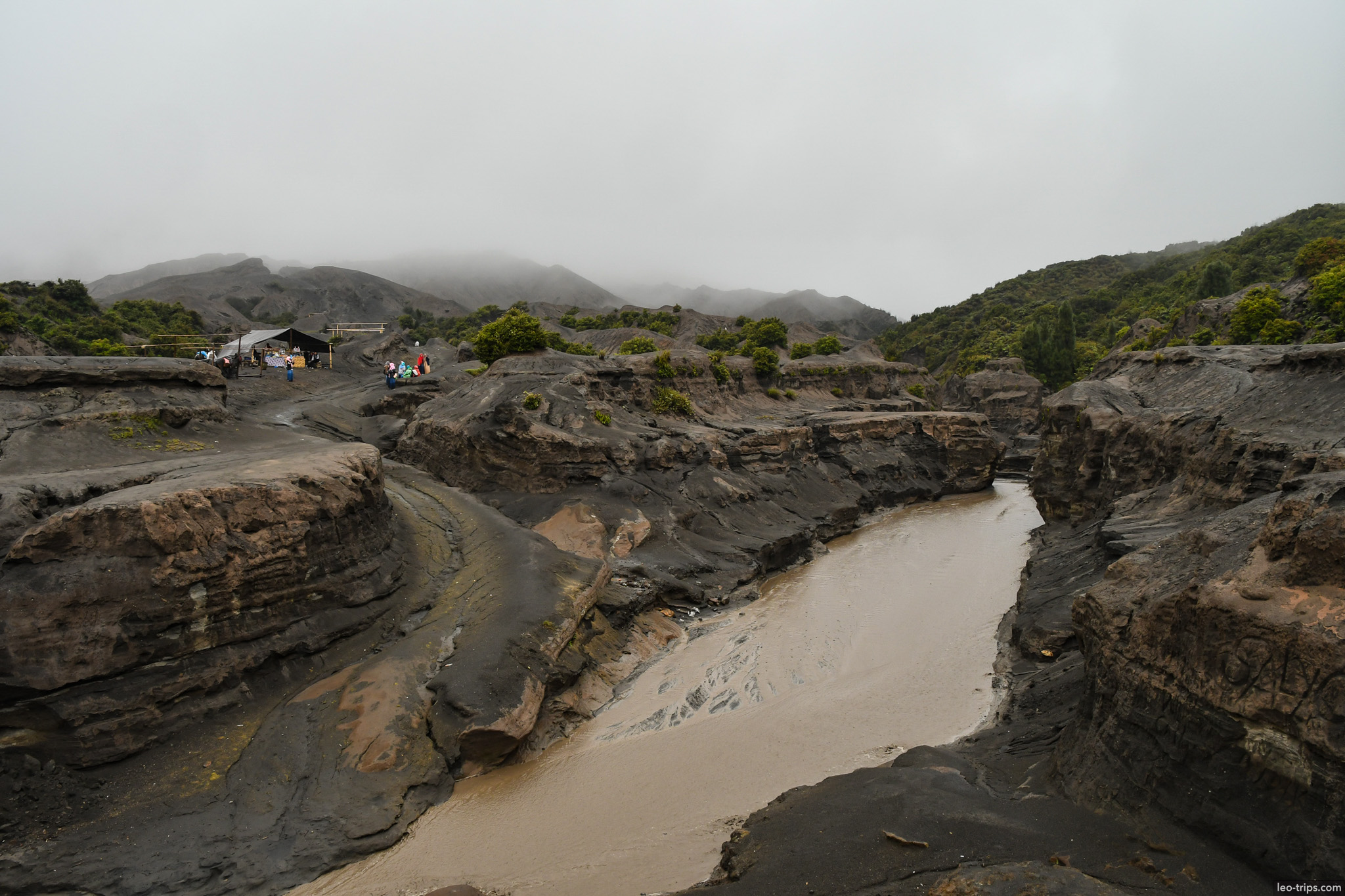 volcanic canyon with muddy river bromo mount bromo