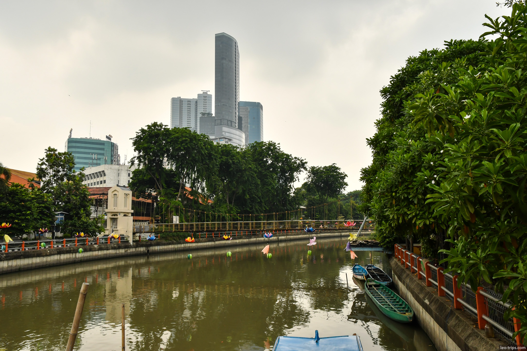 kalimas river decorated boats skyscrapers background surabaya