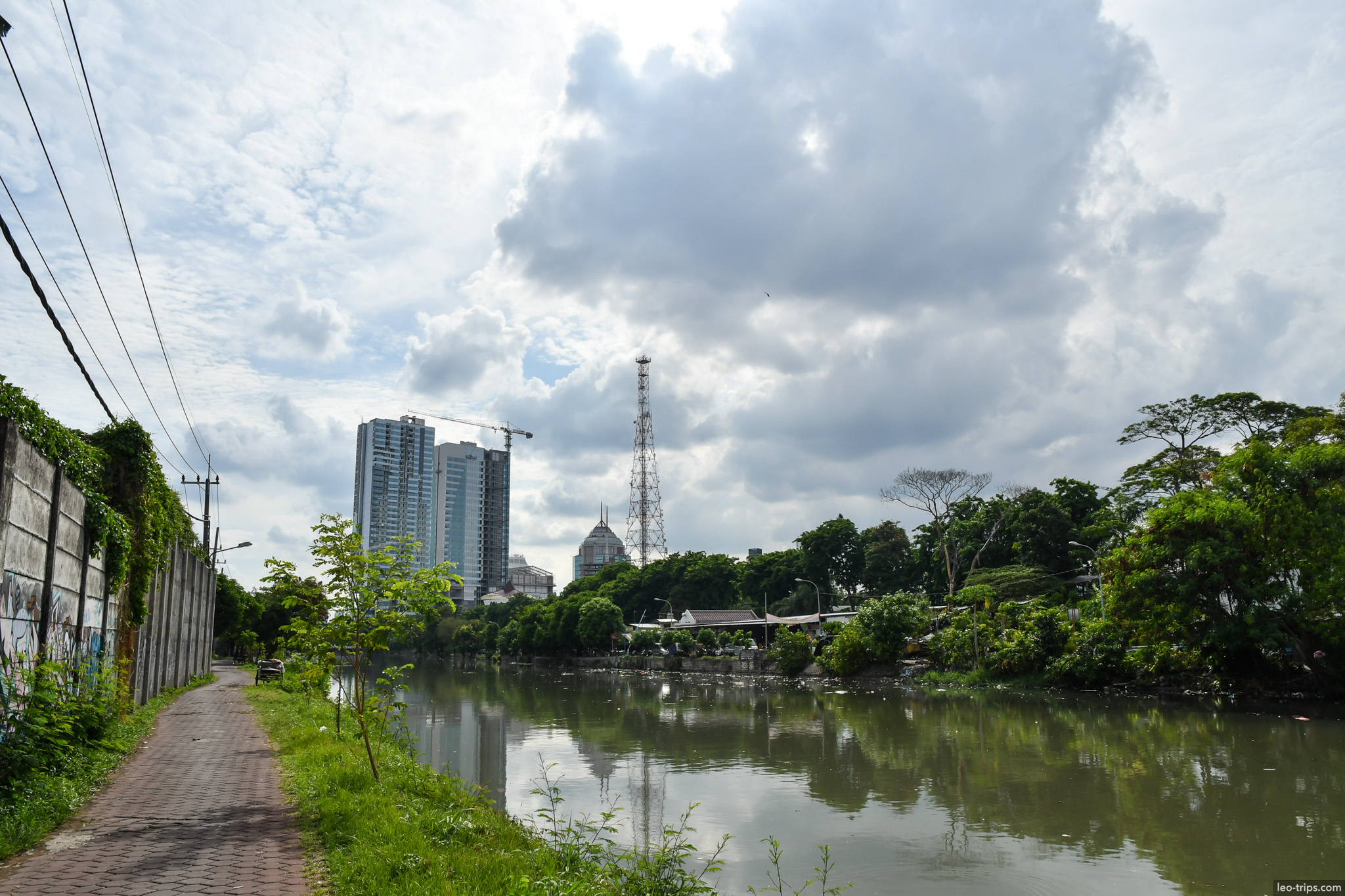 kalimas river path skyline clouds surabaya surabaya