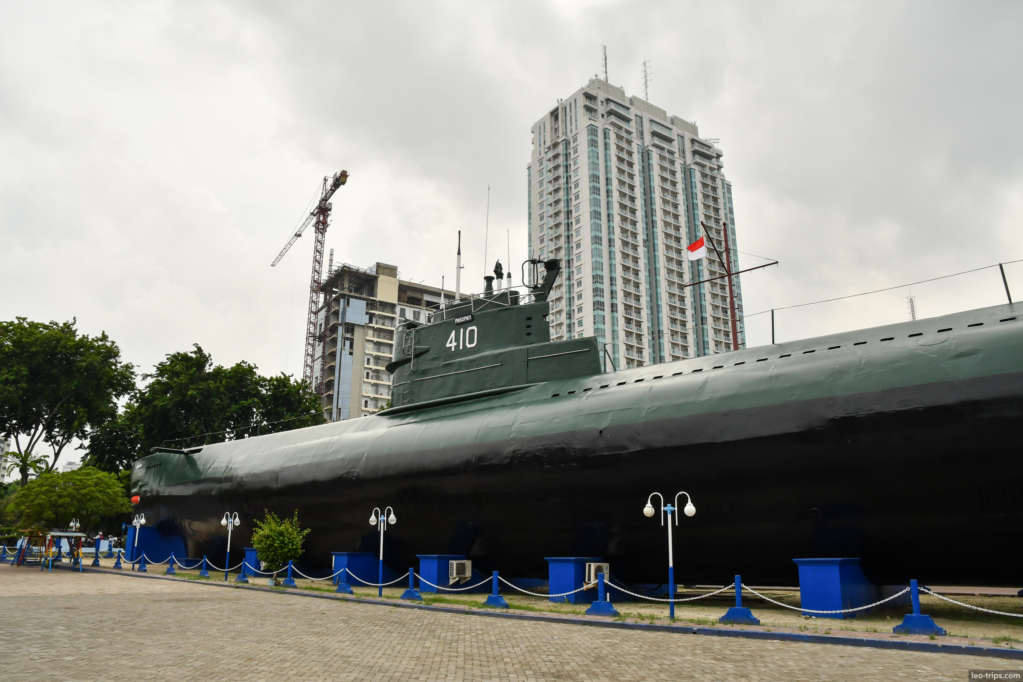monkasel submarine 410 hull skyscraper background surabaya