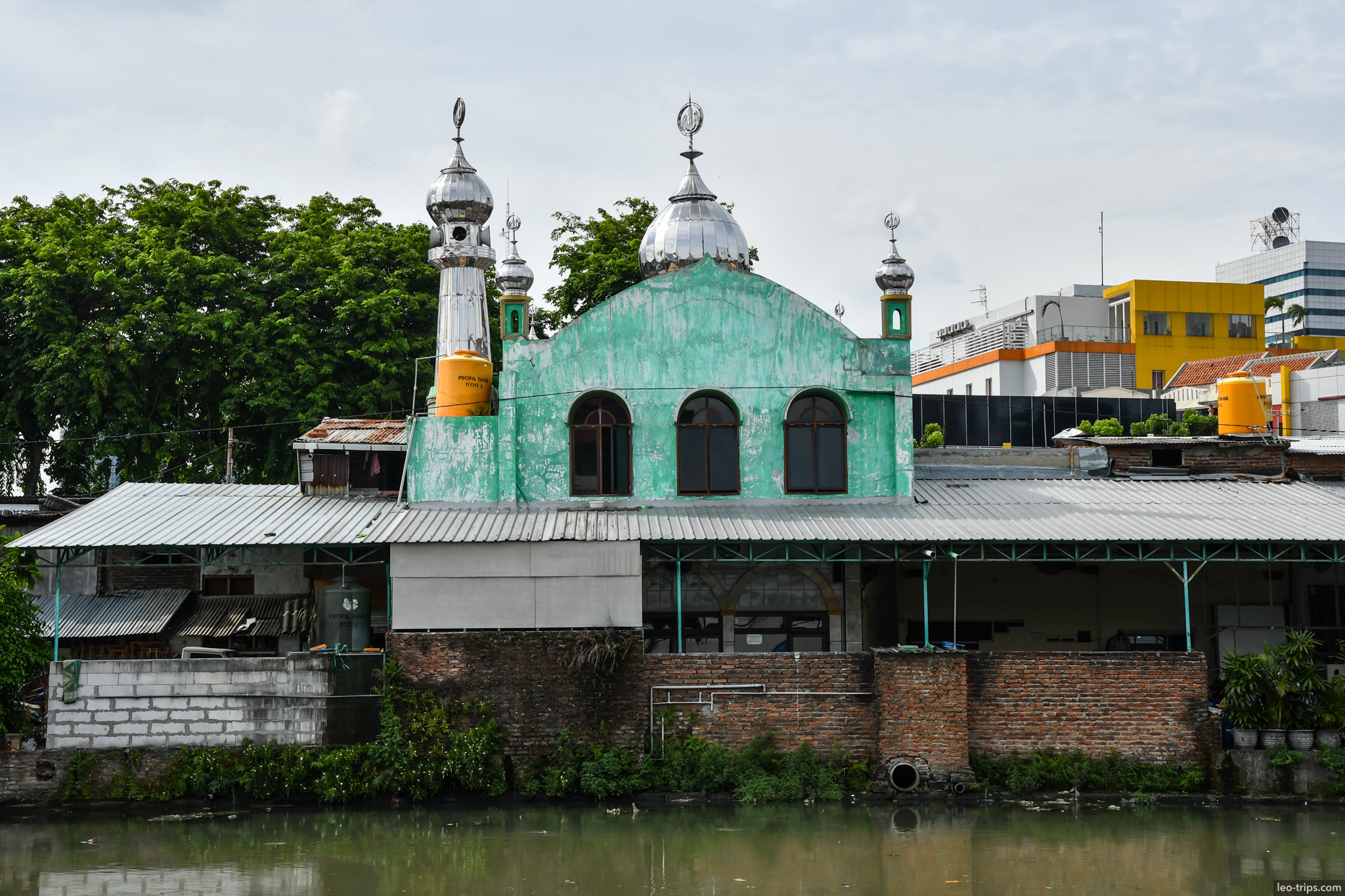 small green mosque silver domes riverside surabaya