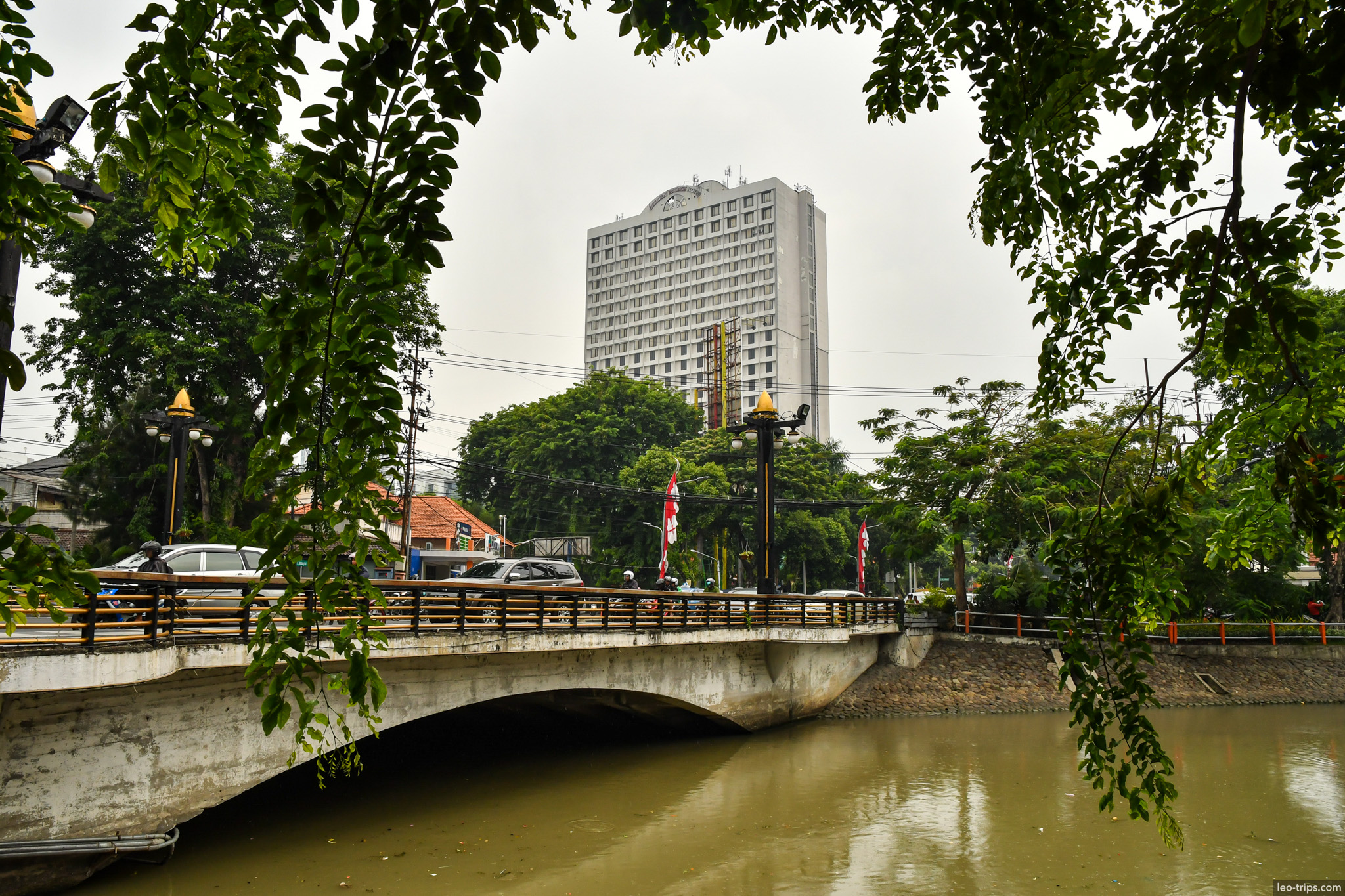 stone bridge over kalimas river hotel background surabaya