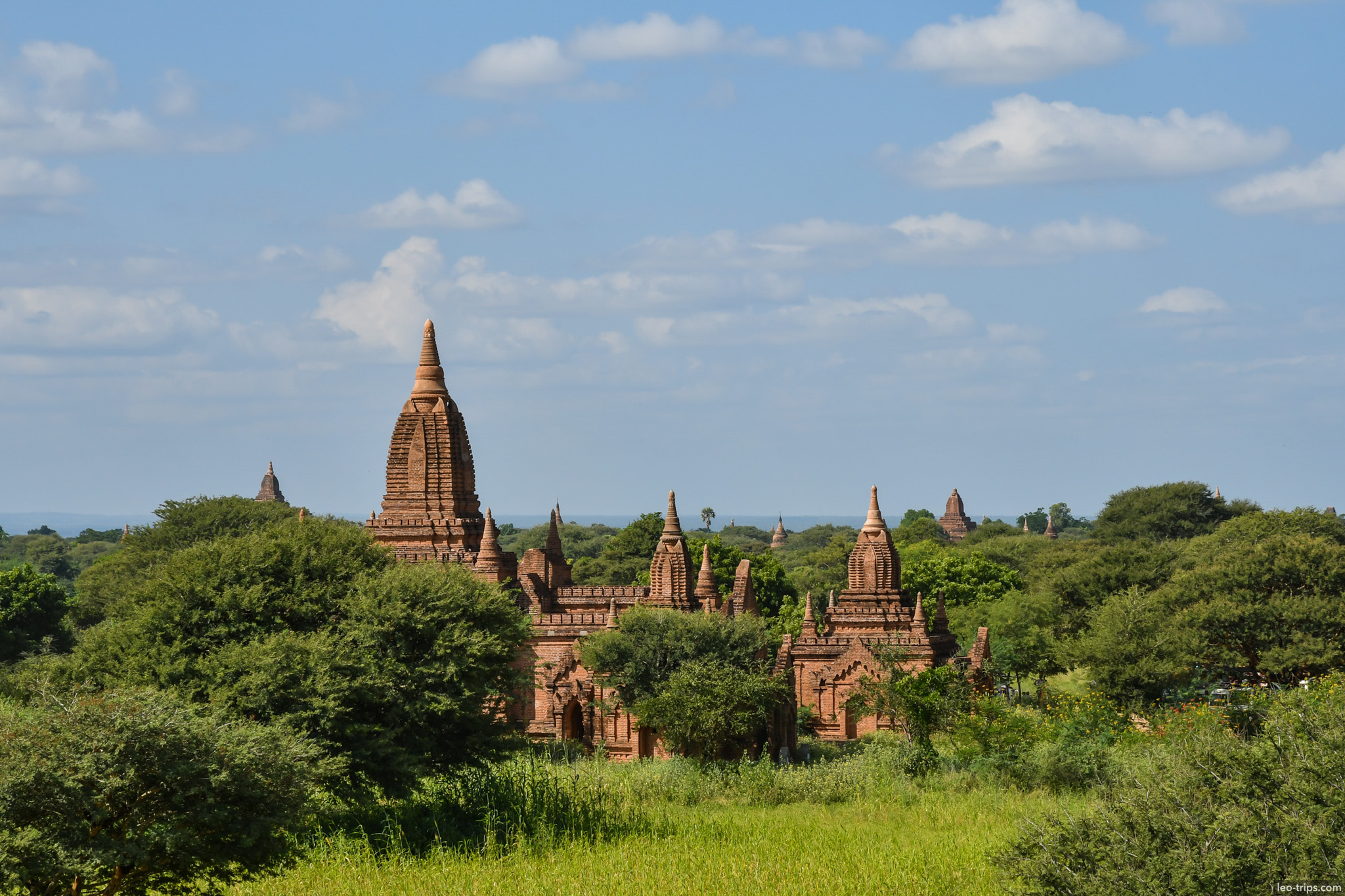 brick temple cluster among green canopy bagan bagan