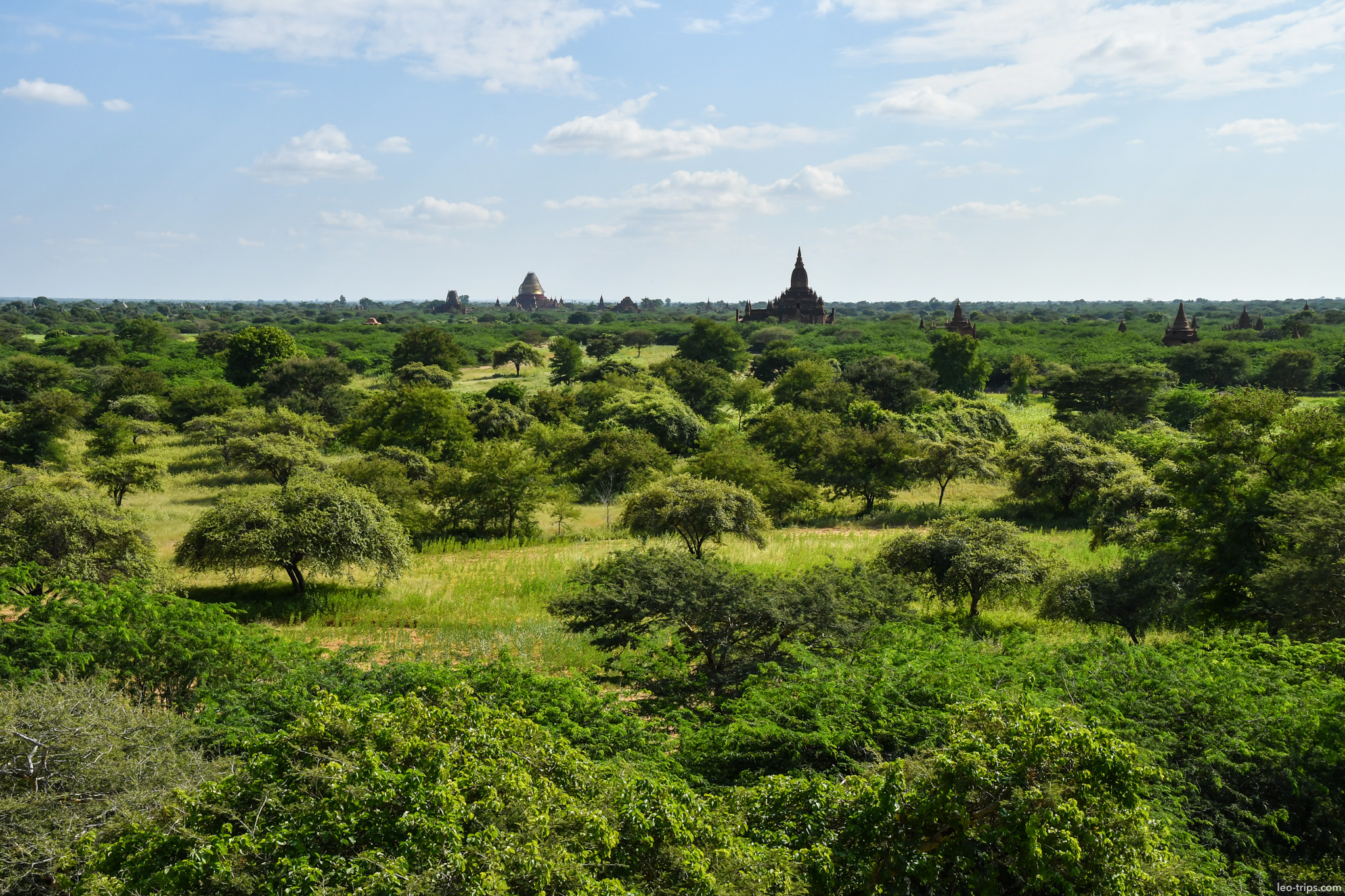 green plain with distant temples aerial bagan bagan
