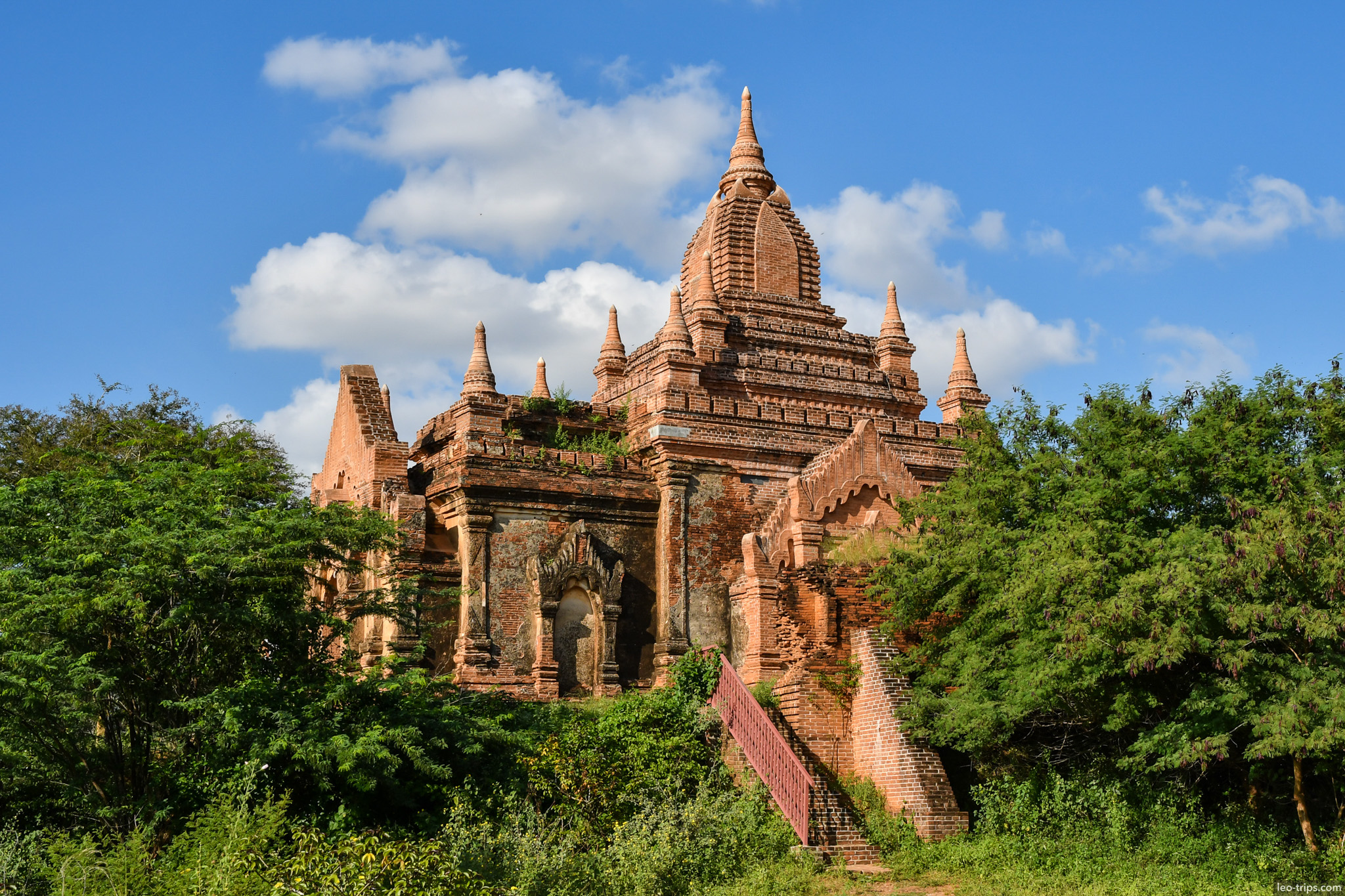 hilltop temple with stairway overgrown bagan bagan