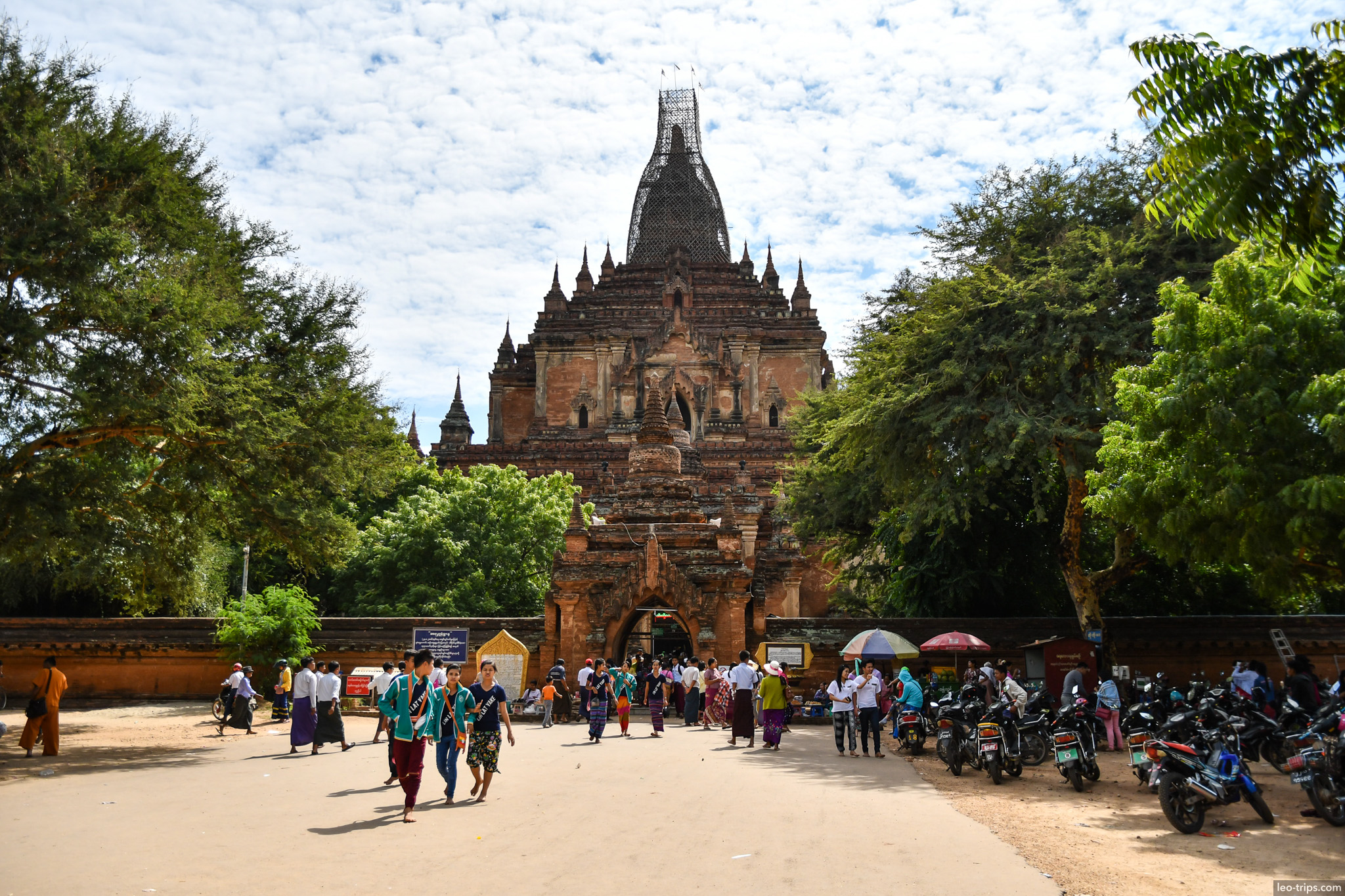 htilominlo temple entrance with visitors bagan bagan