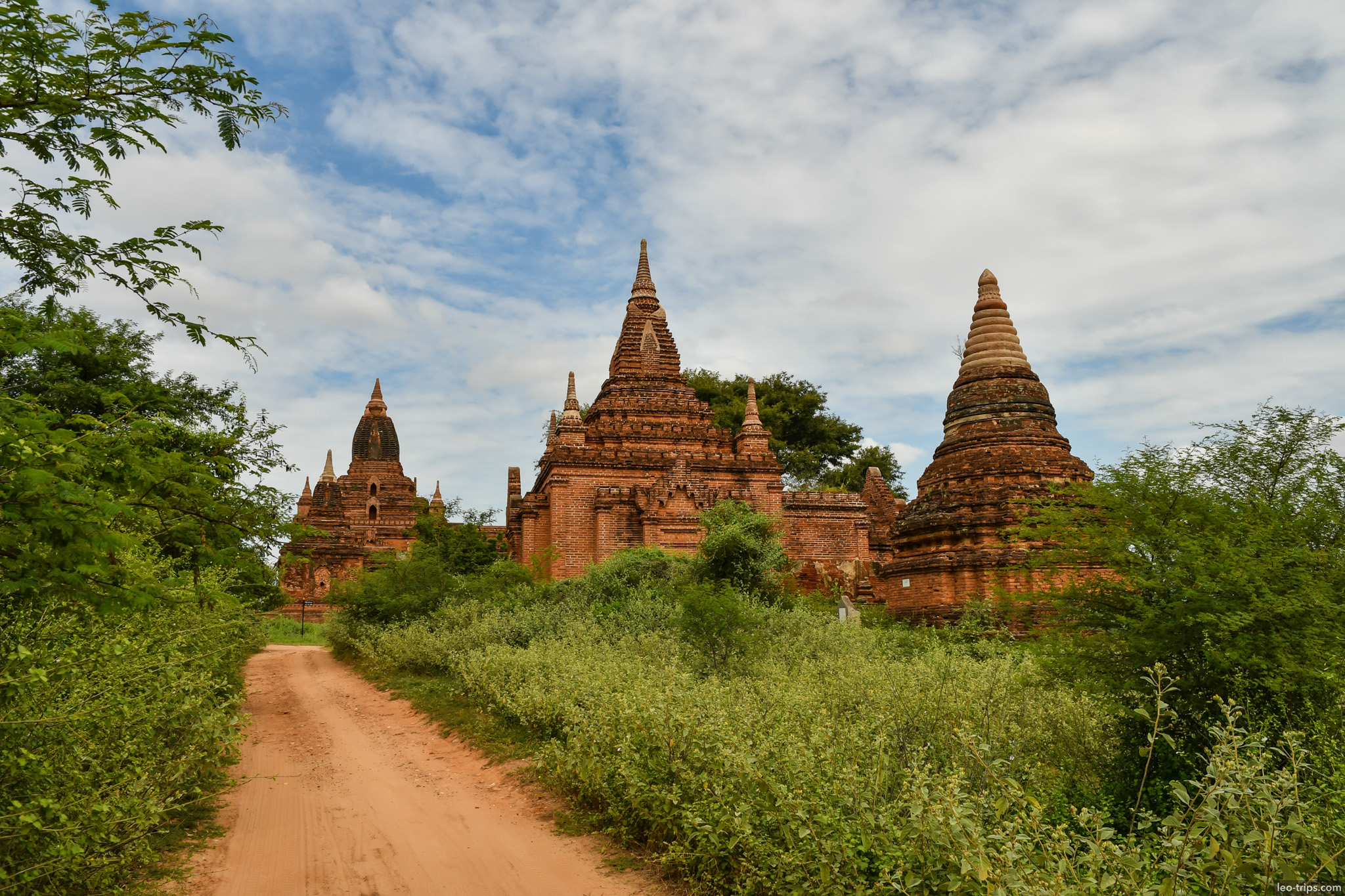 red brick temple cluster dirt path bagan bagan