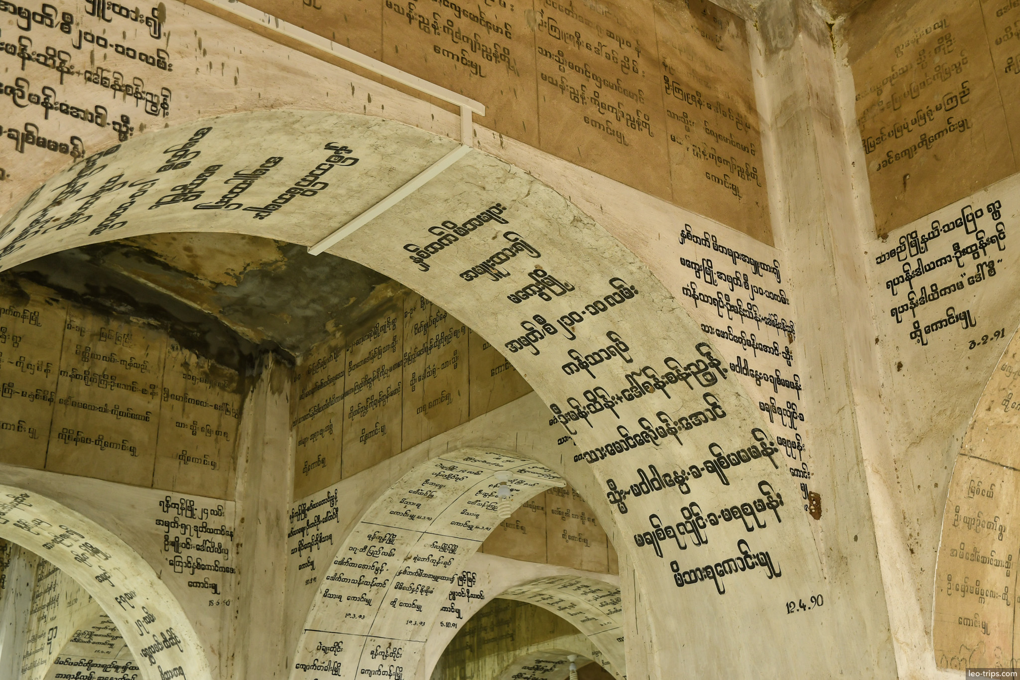 burmese script inscriptions arched stupa walls mandalay