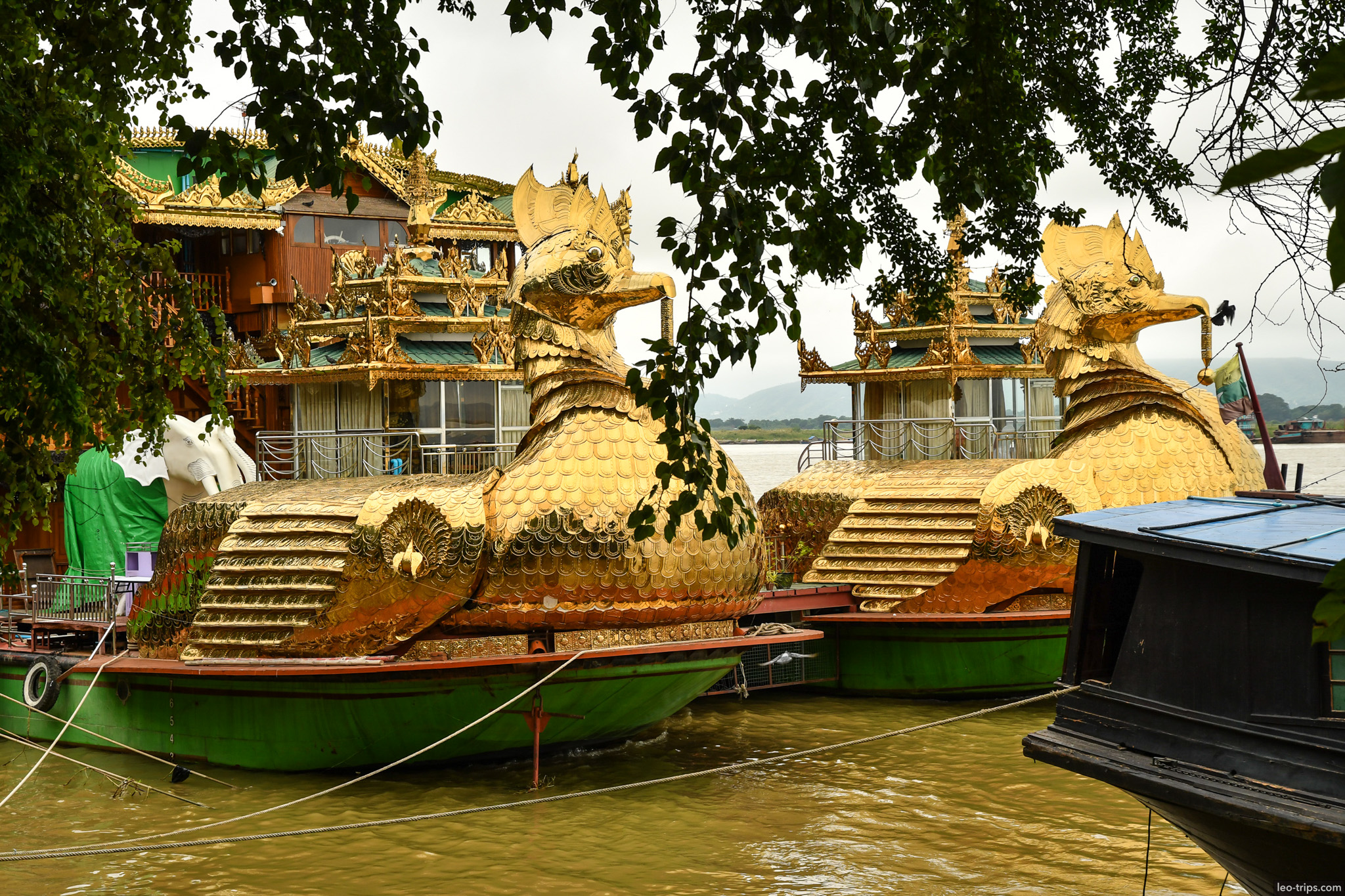 golden hintha bird sculptures floating restaurant mandalay