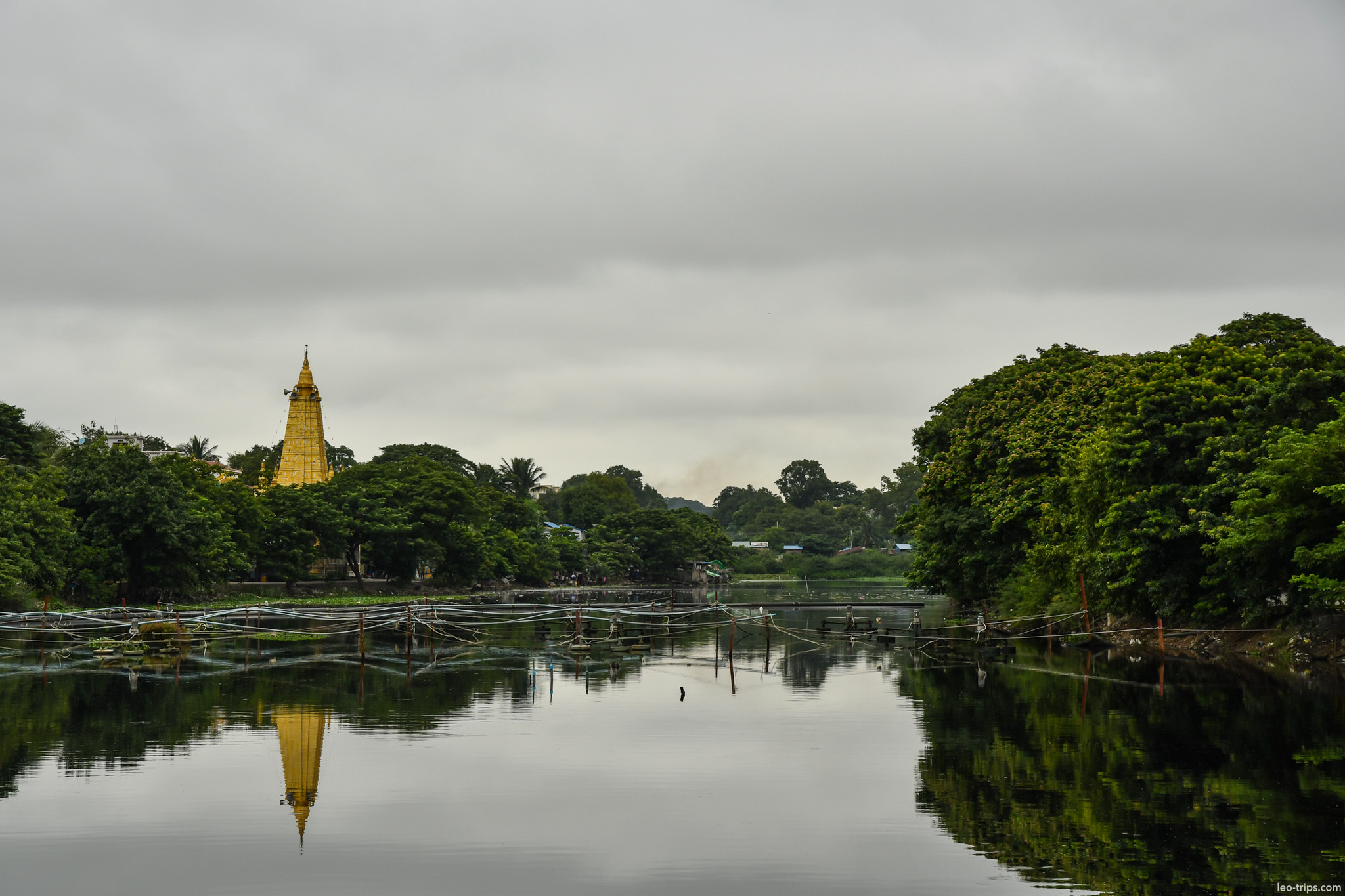 golden pagoda reflected in lake mandalay mandalay