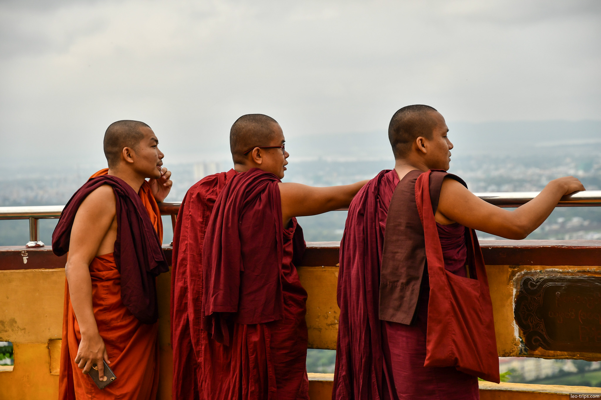 three buddhist monks enjoying view mandalay hill mandalay