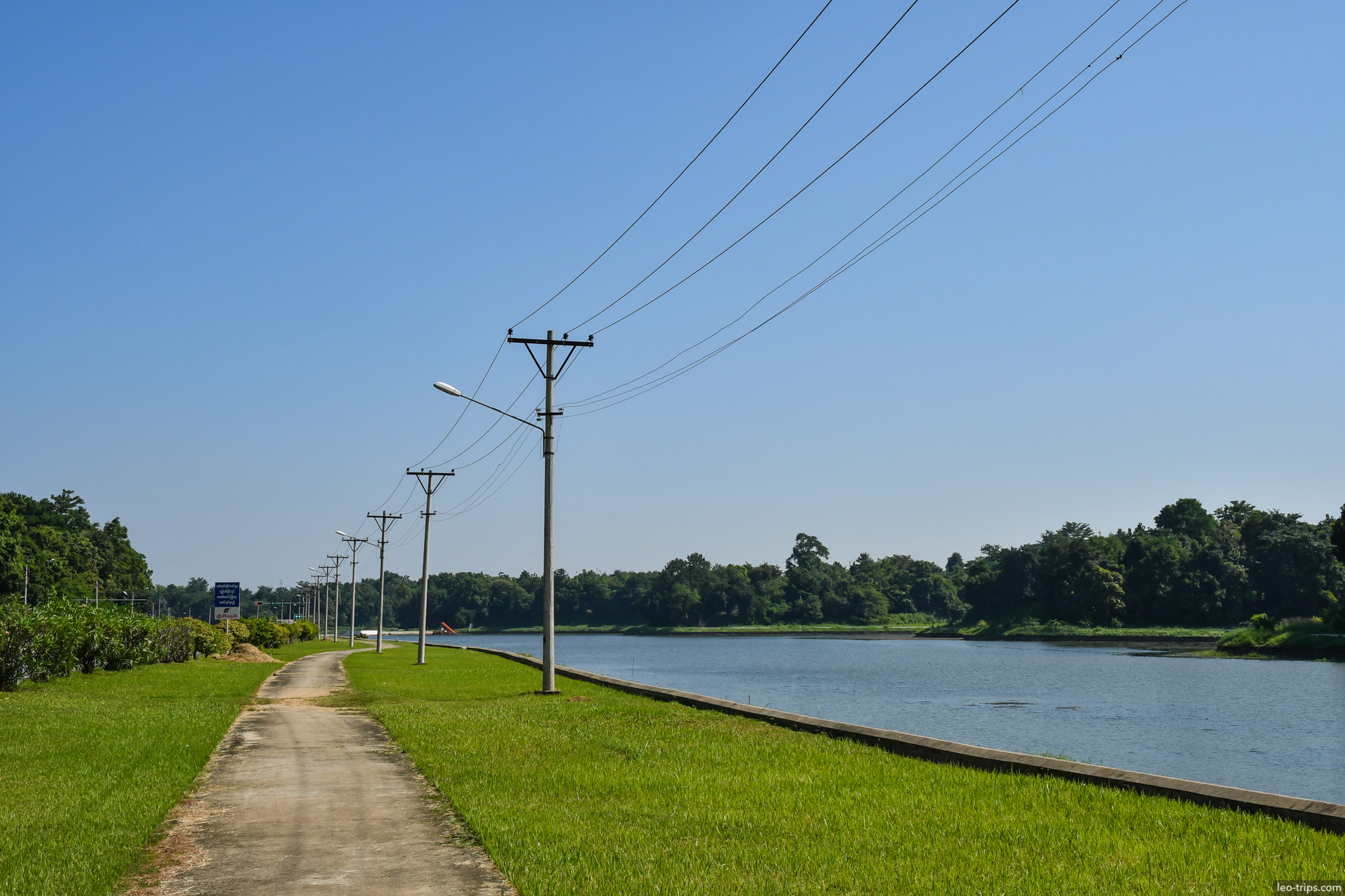 path along river with green grass naypyidaw naypyidaw