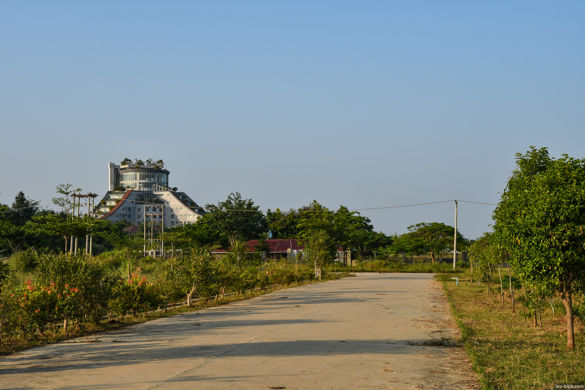 pyramid shaped hotel and dirt road naypyidaw naypyidaw