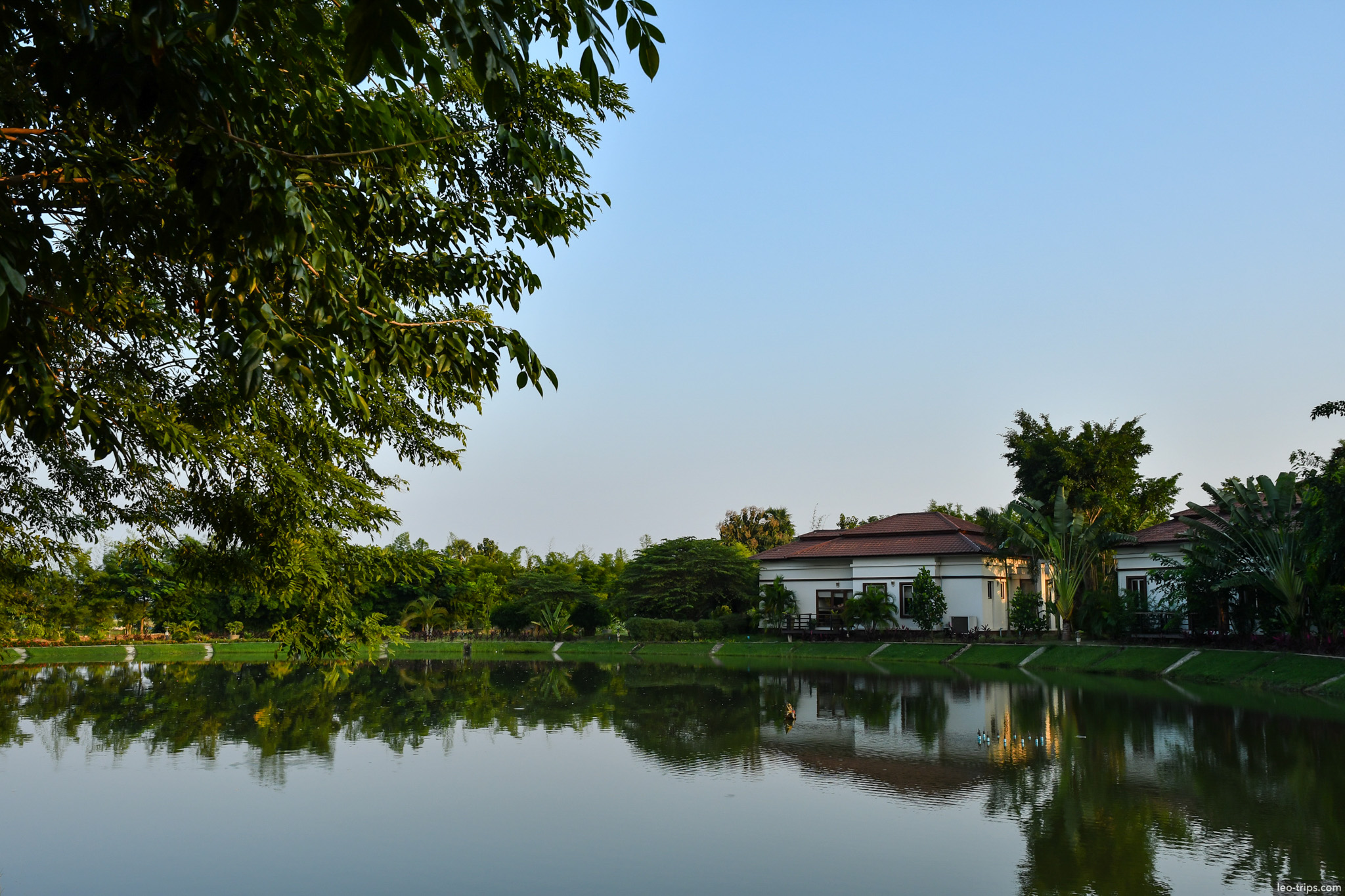 villa reflected in garden pond naypyidaw naypyidaw