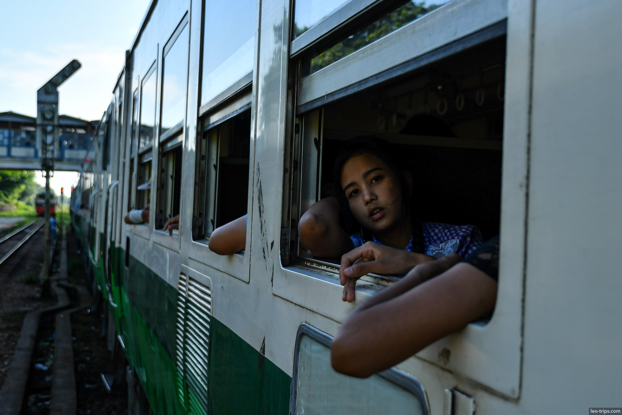 yangon girl looking out train window circular railway yangon