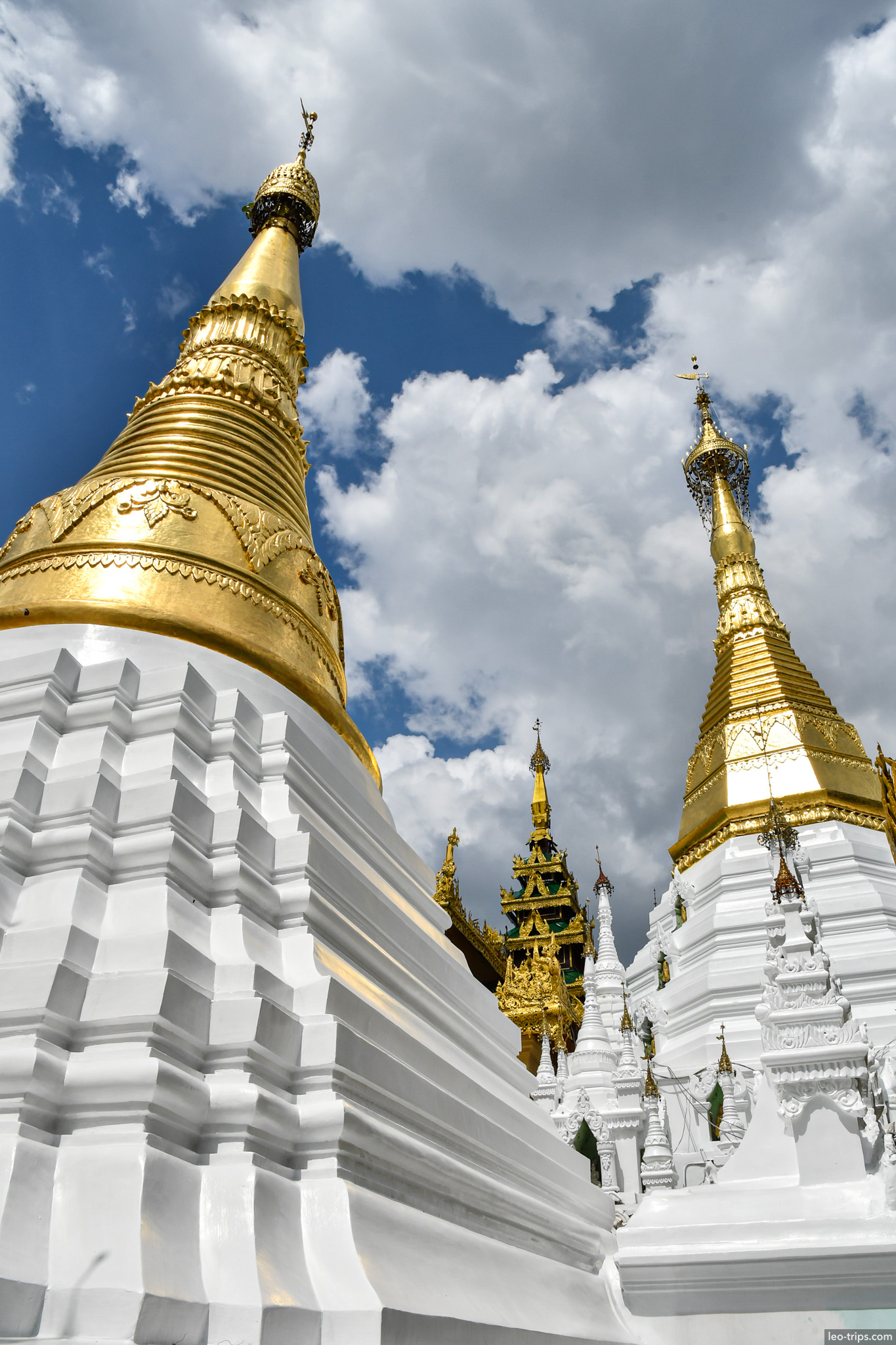 yangon shwedagon pagoda white golden stupas blue sky yangon