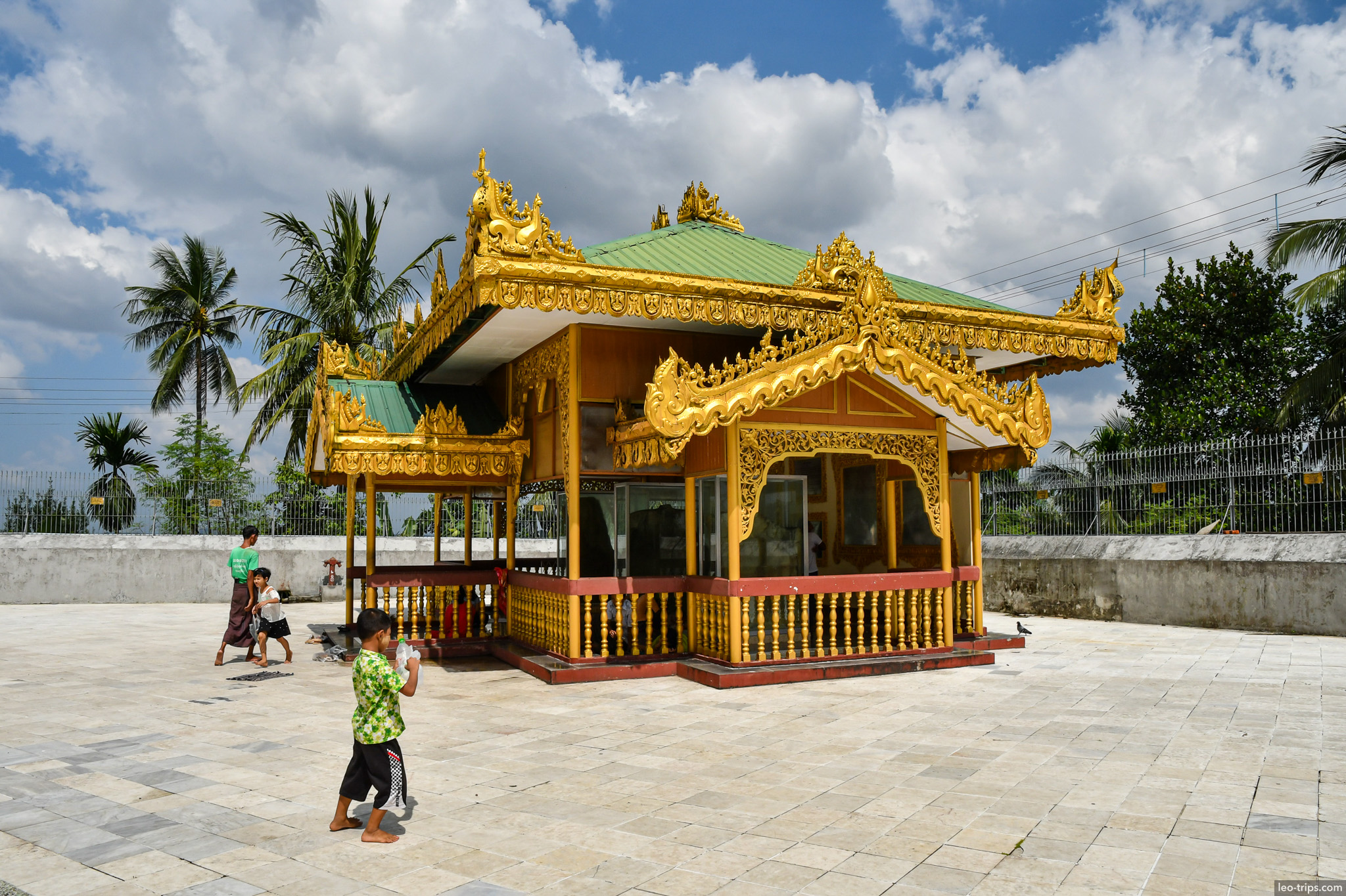 yangon small buddhist golden pavilion children playing yangon