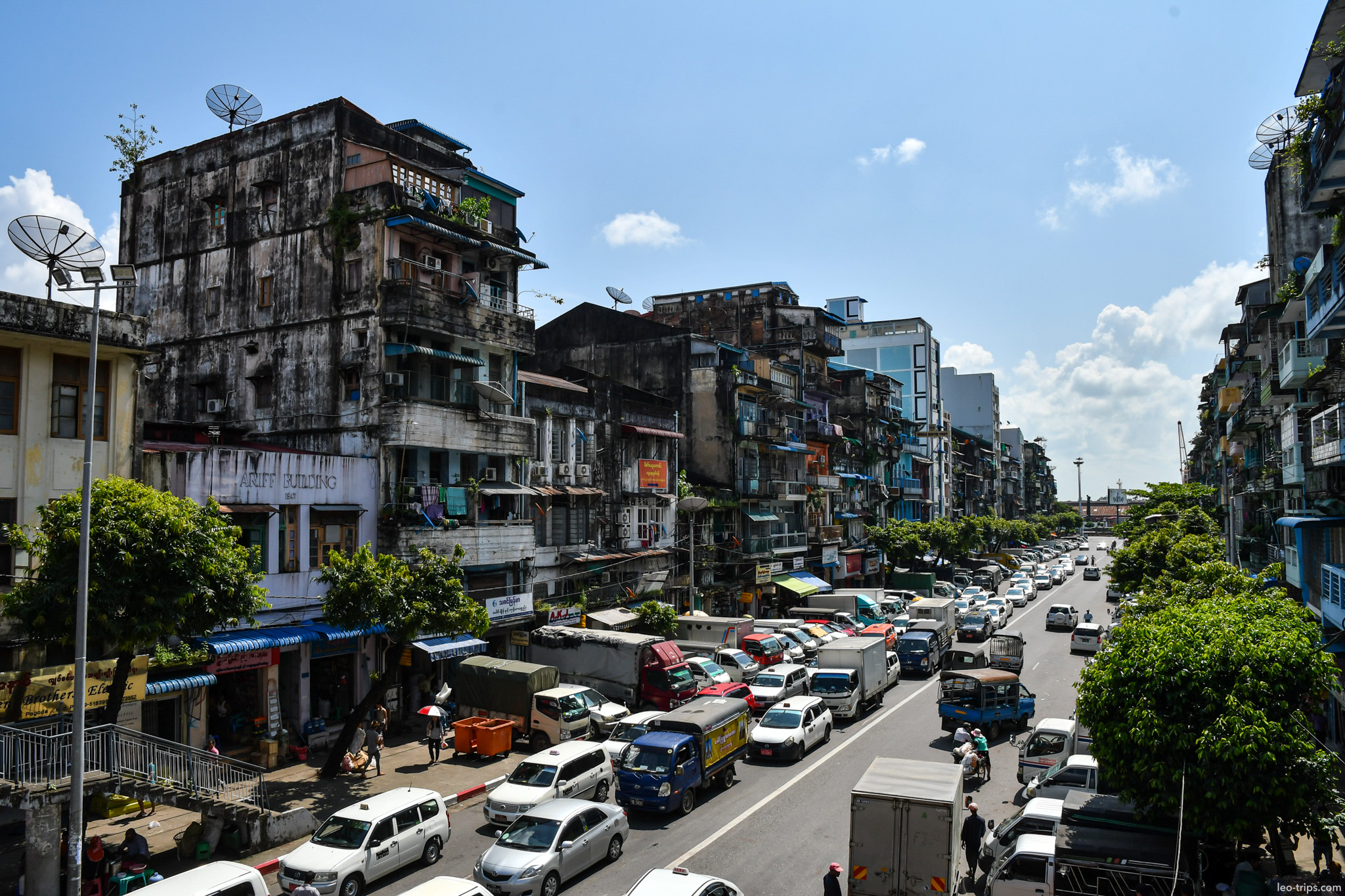 yangon strand road dilapidated buildings heavy traffic yangon