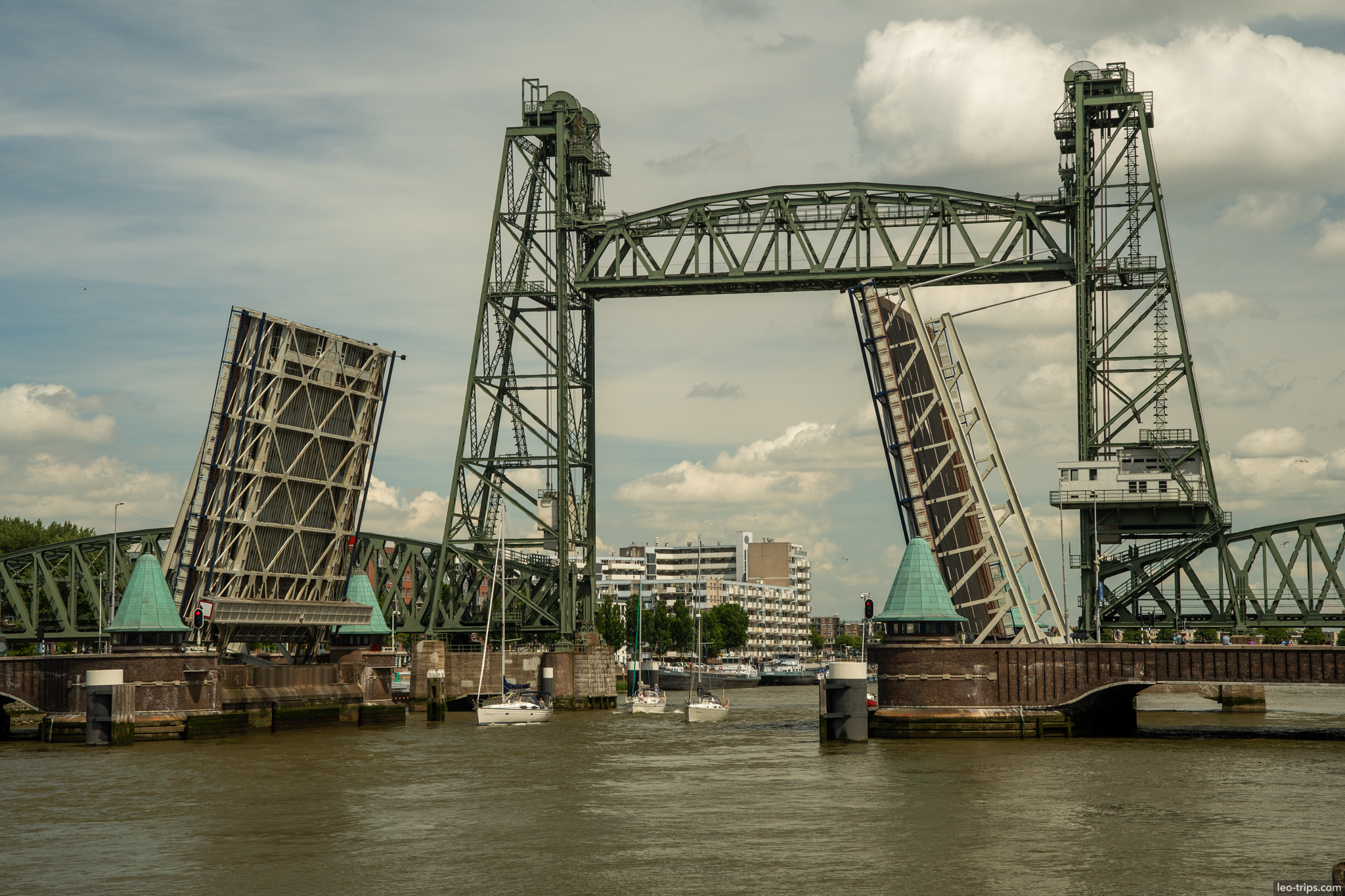 de hef bridge open sailboats passing rotterdam