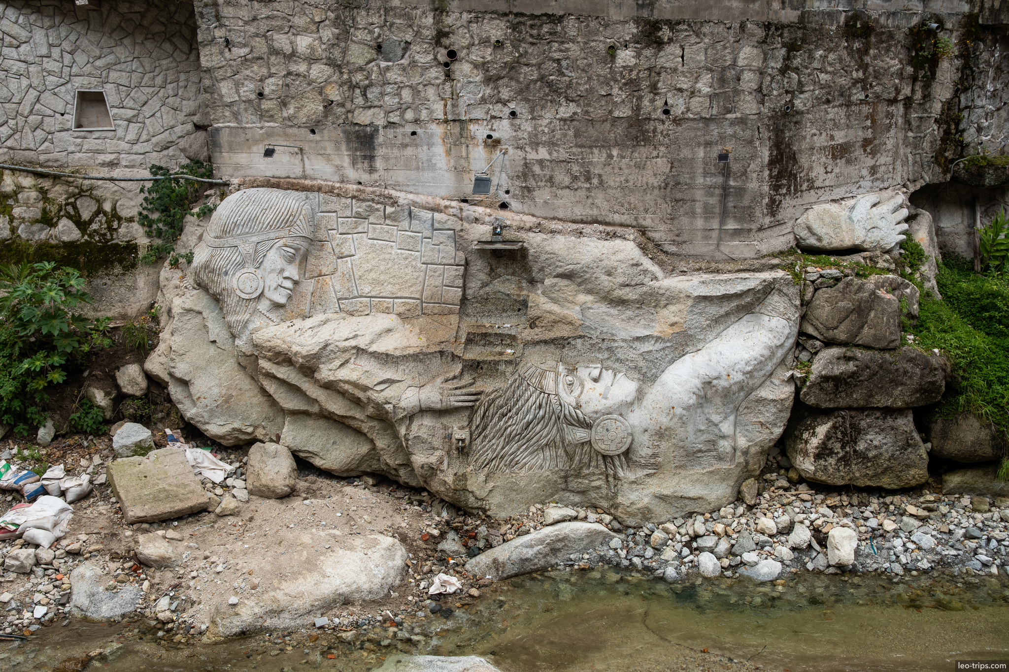 aguas calientes inca rock sculpture riverbank around aguas calientes