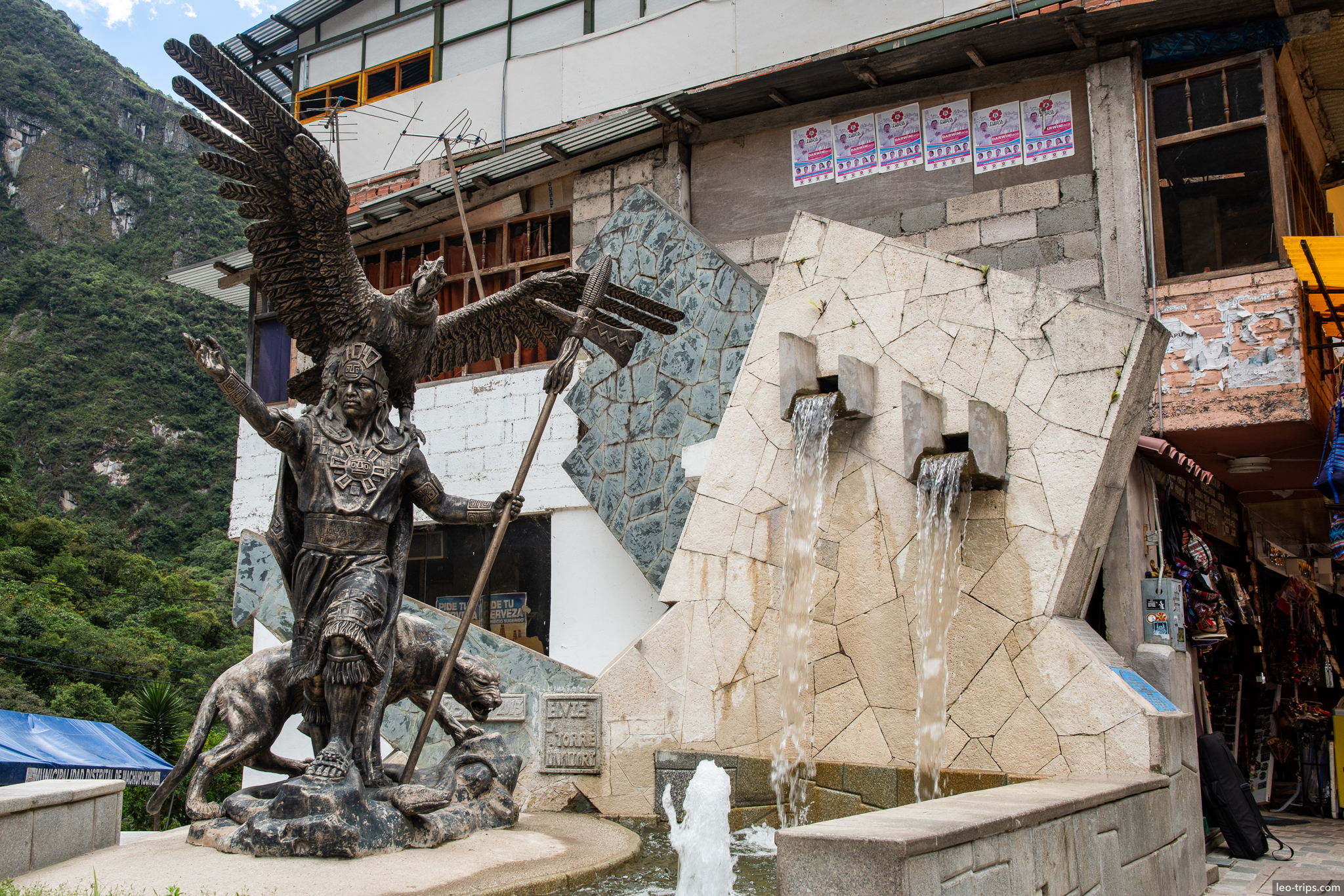 aguas calientes inca warrior statue fountain around aguas calientes