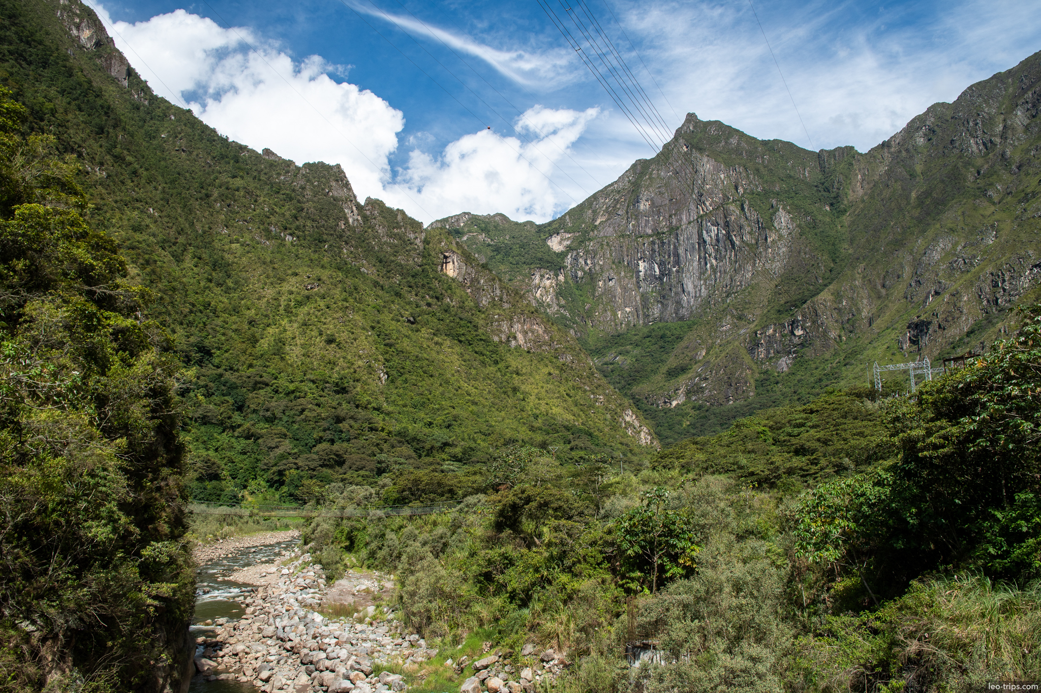 hidroelectrica canyon river power lines peaks around aguas calientes