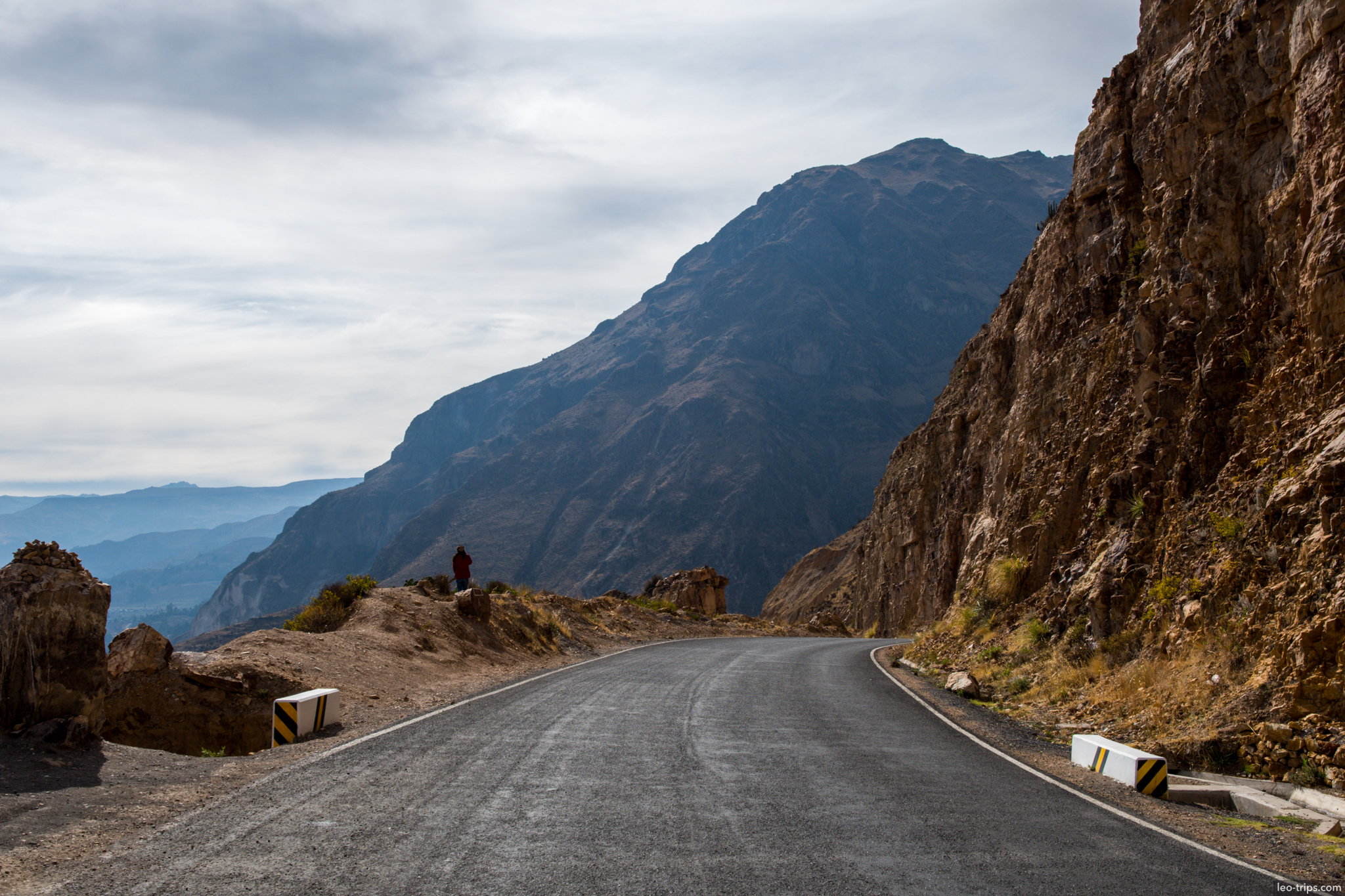 mountain road cliff edge colca canyon hiker colca canyon