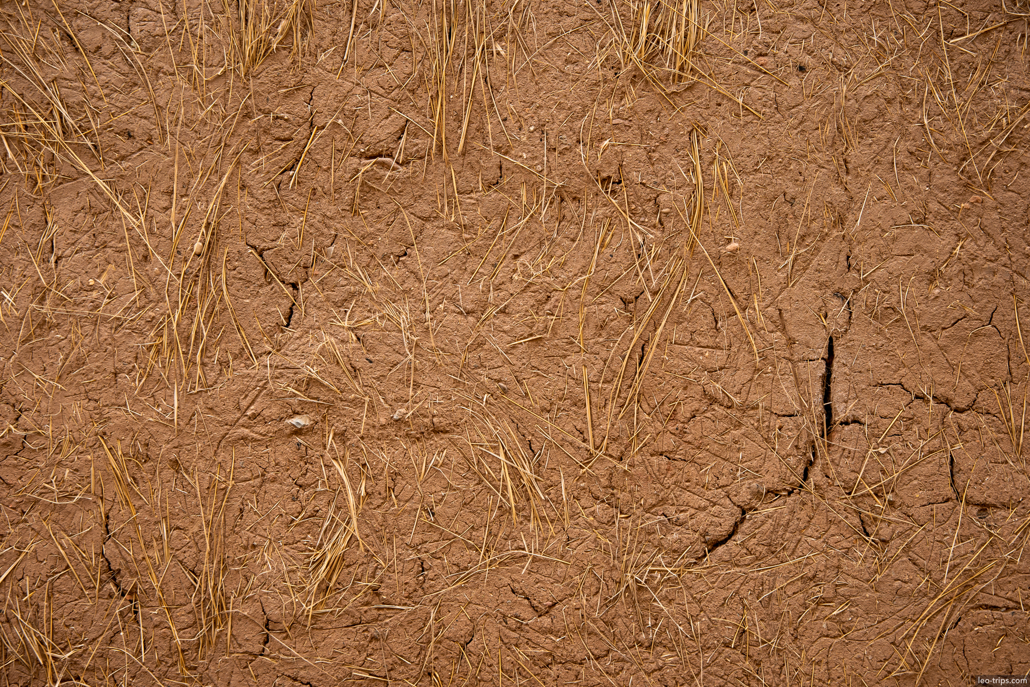 cracked clay earth dry grass texture cusco