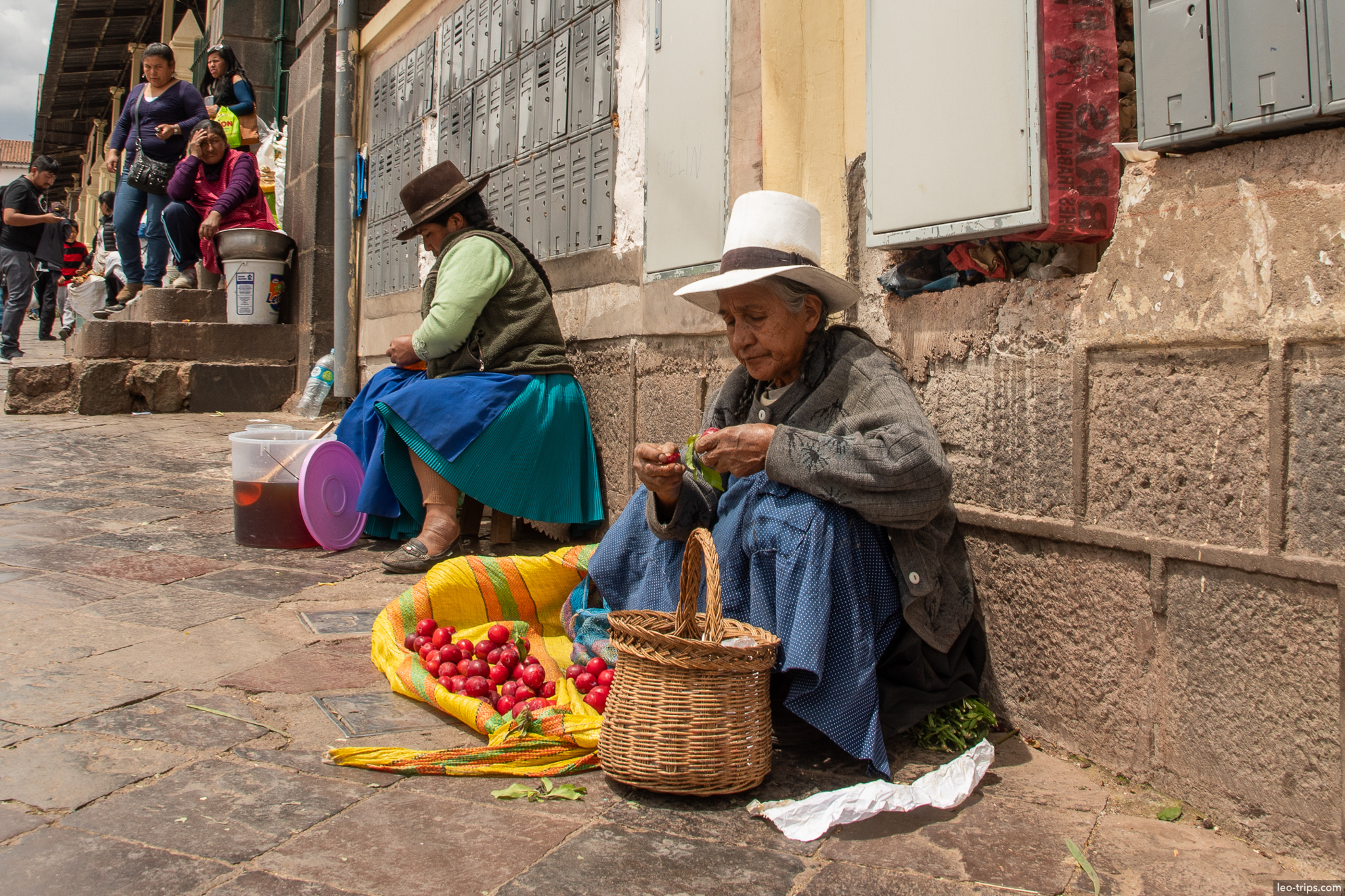 quechua women selling fruit plaza steps cusco