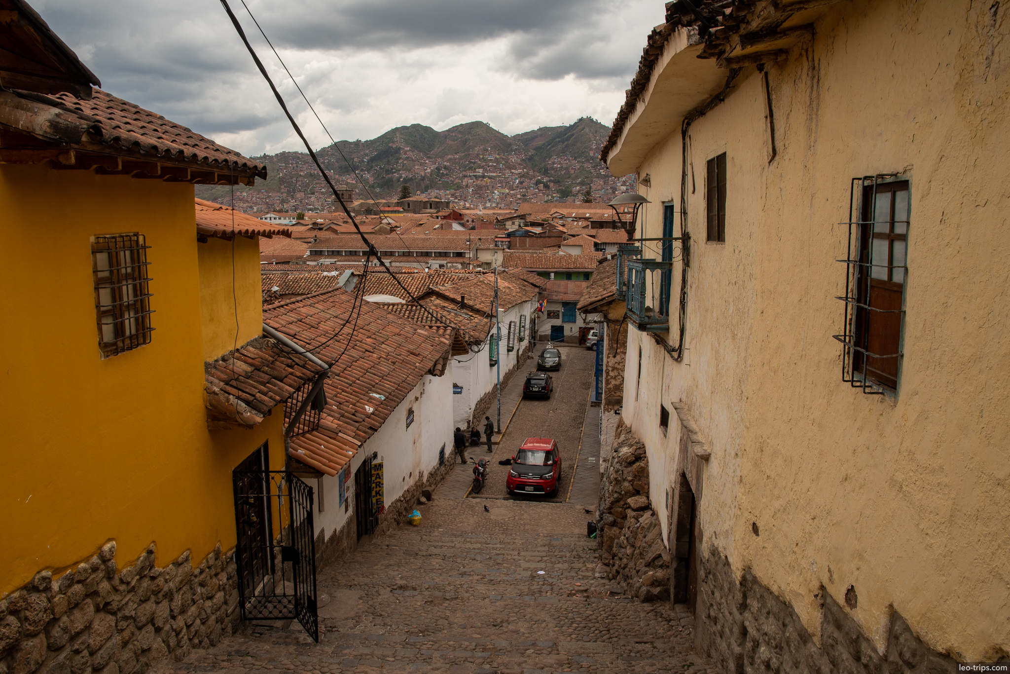 san blas cobblestone street cusco downhill view cusco