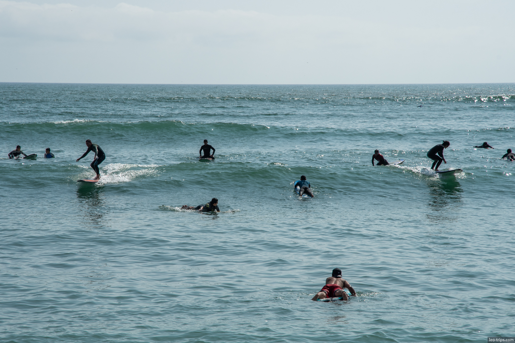miraflores beach surfers waves pacific lima