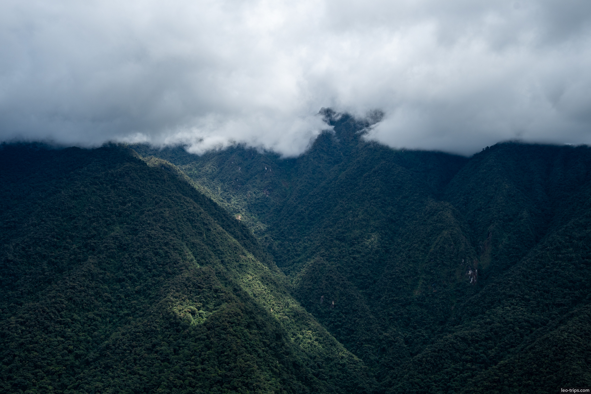 dark andes mountains low clouds dramatic machu picchu