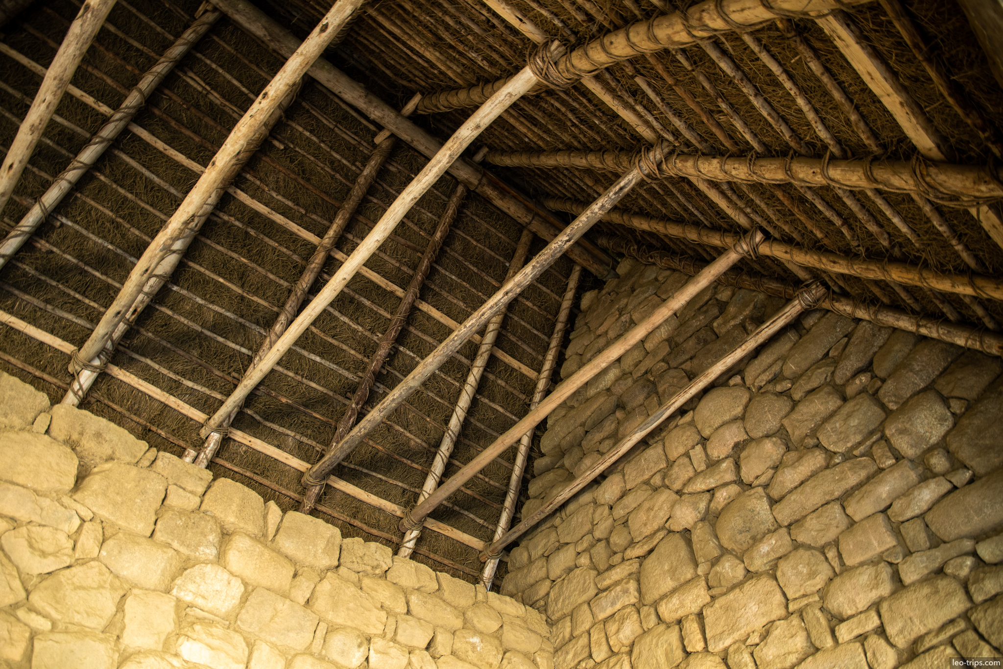 guardhouse interior wooden rafters thatched roof machu picchu