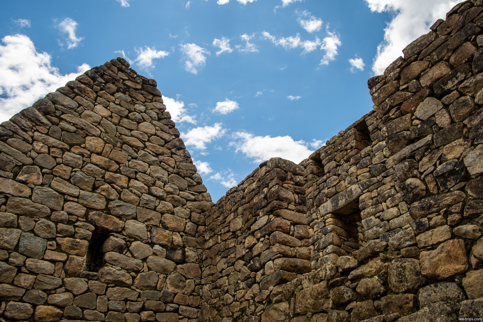 stone walls gable ends blue sky machu picchu