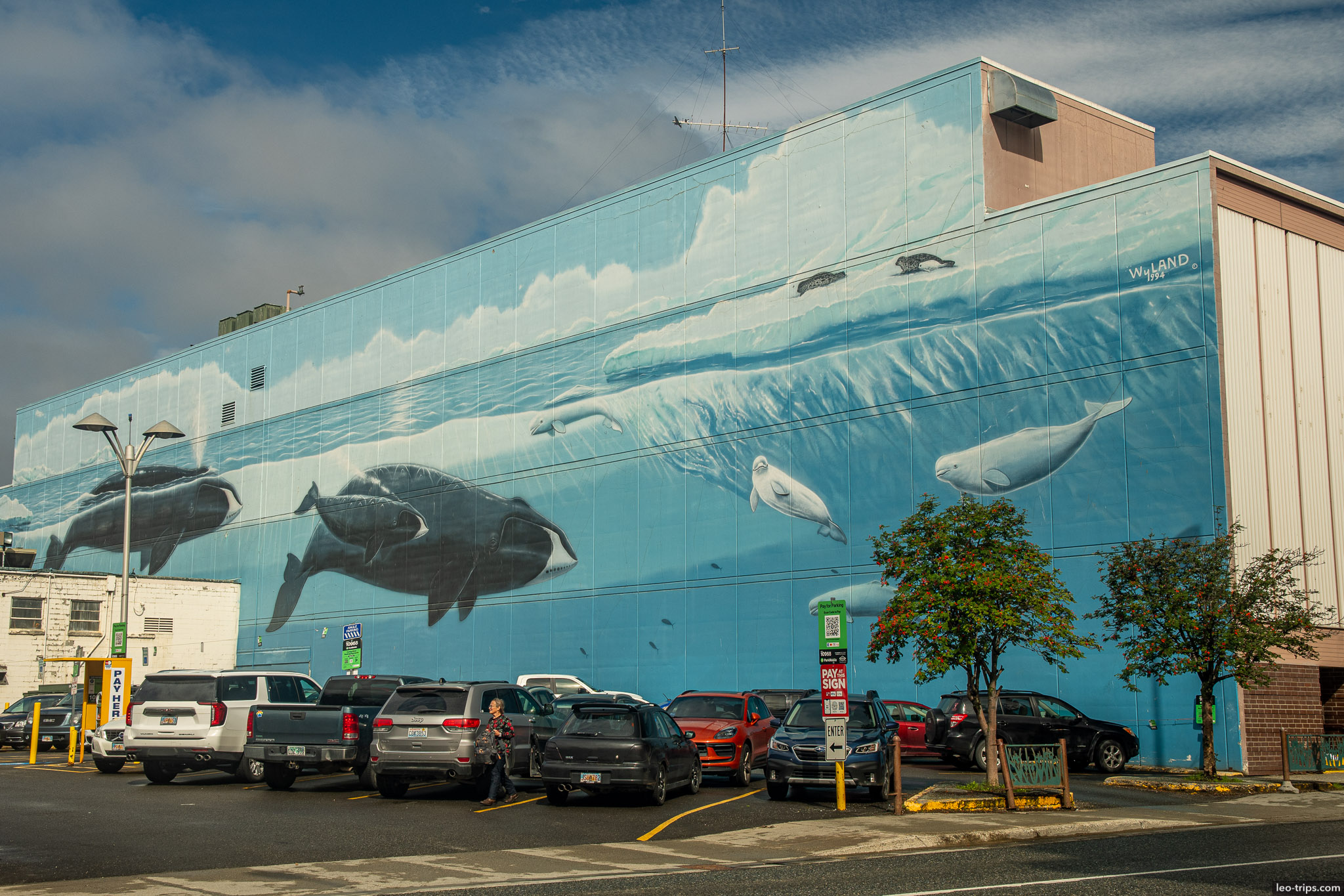 Parking lot with whale mural in background anchorage