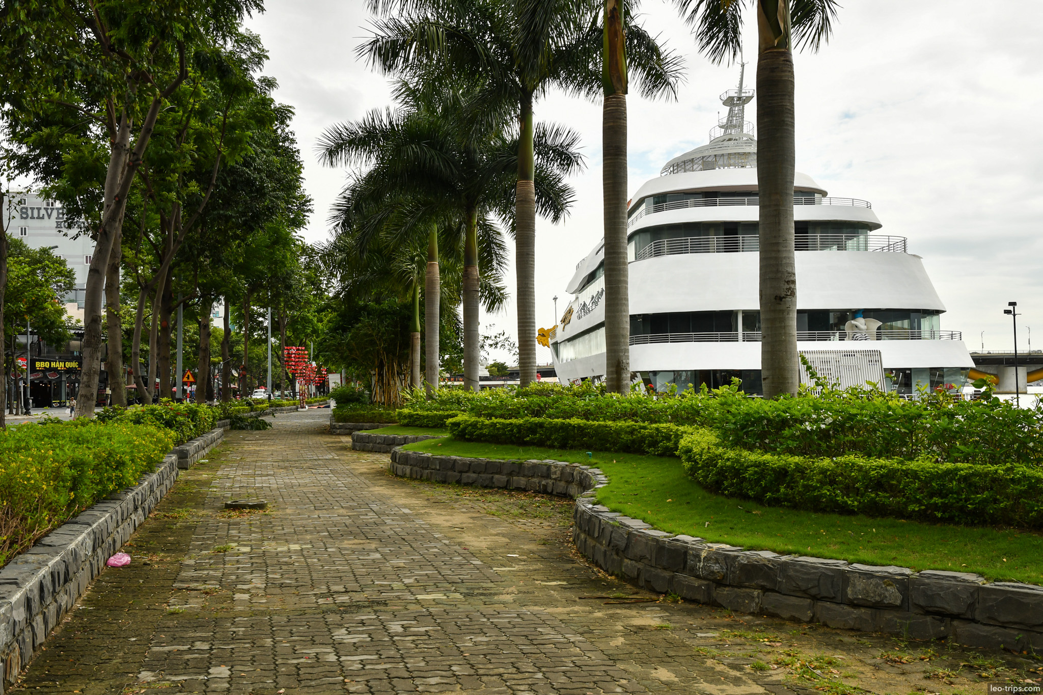 danang riverside park palm trees white building da nang