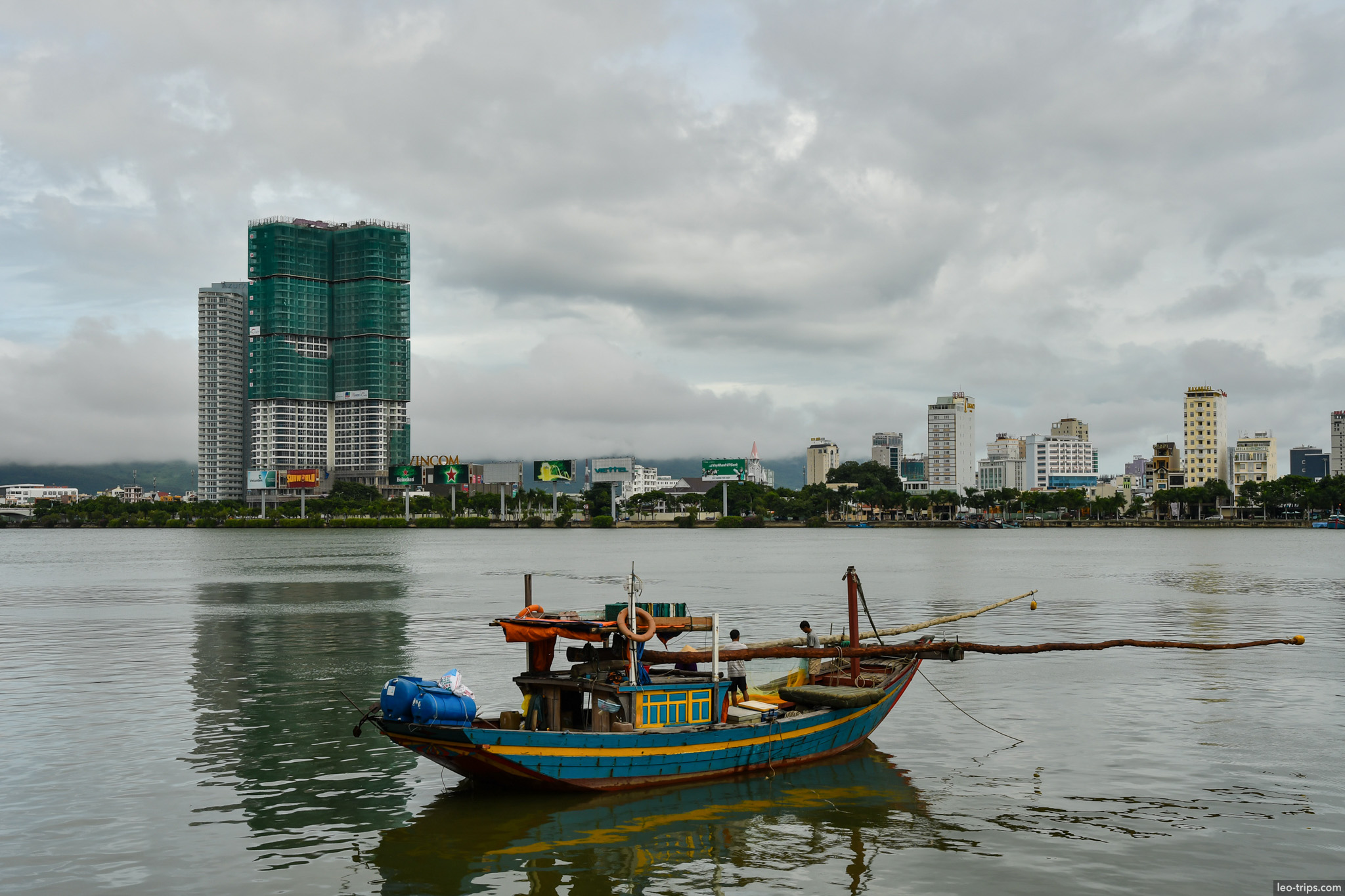 vietnamese fishing boat danang city skyline da nang