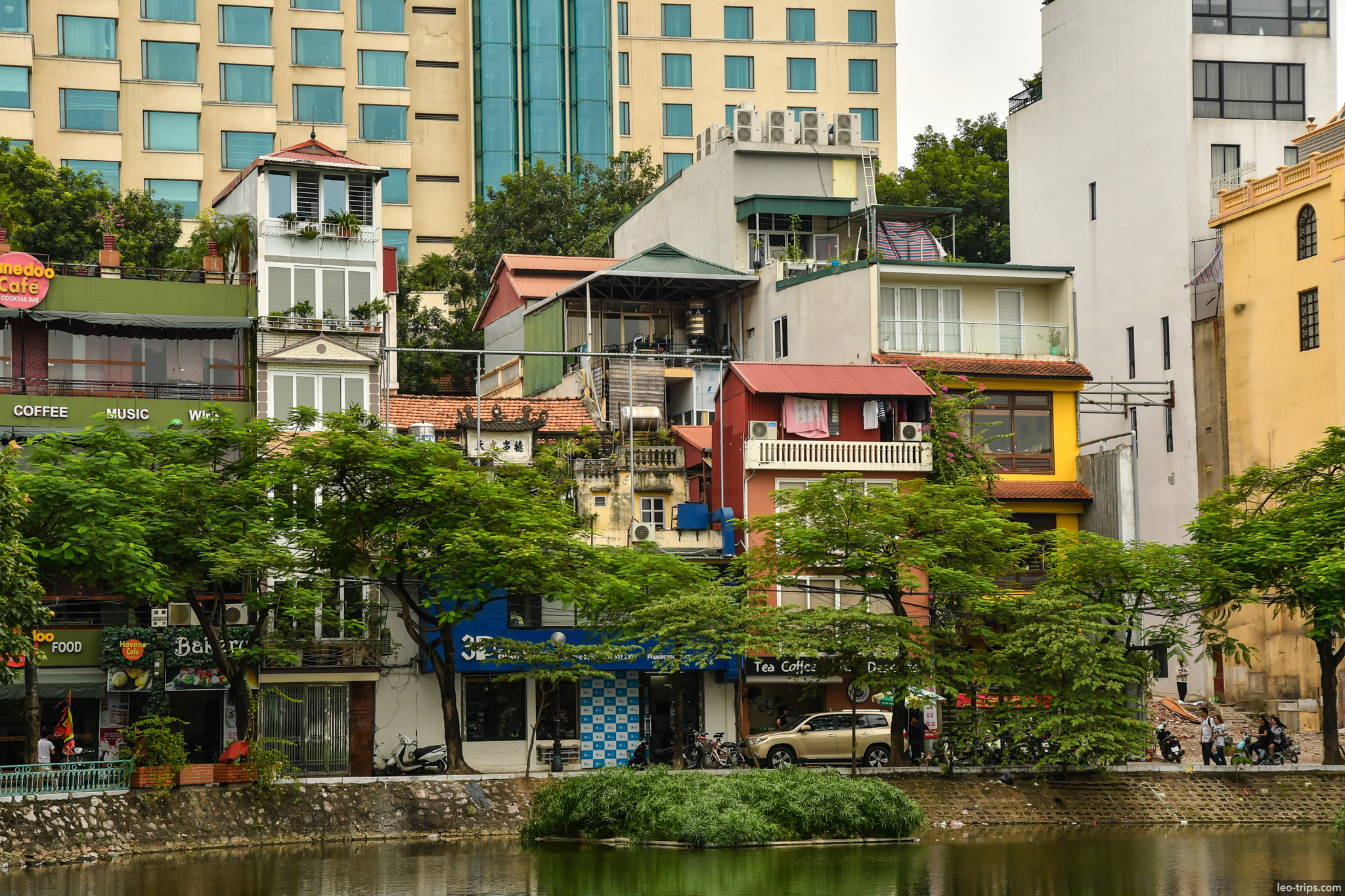 colorful buildings cafe lakeside hanoi hanoi